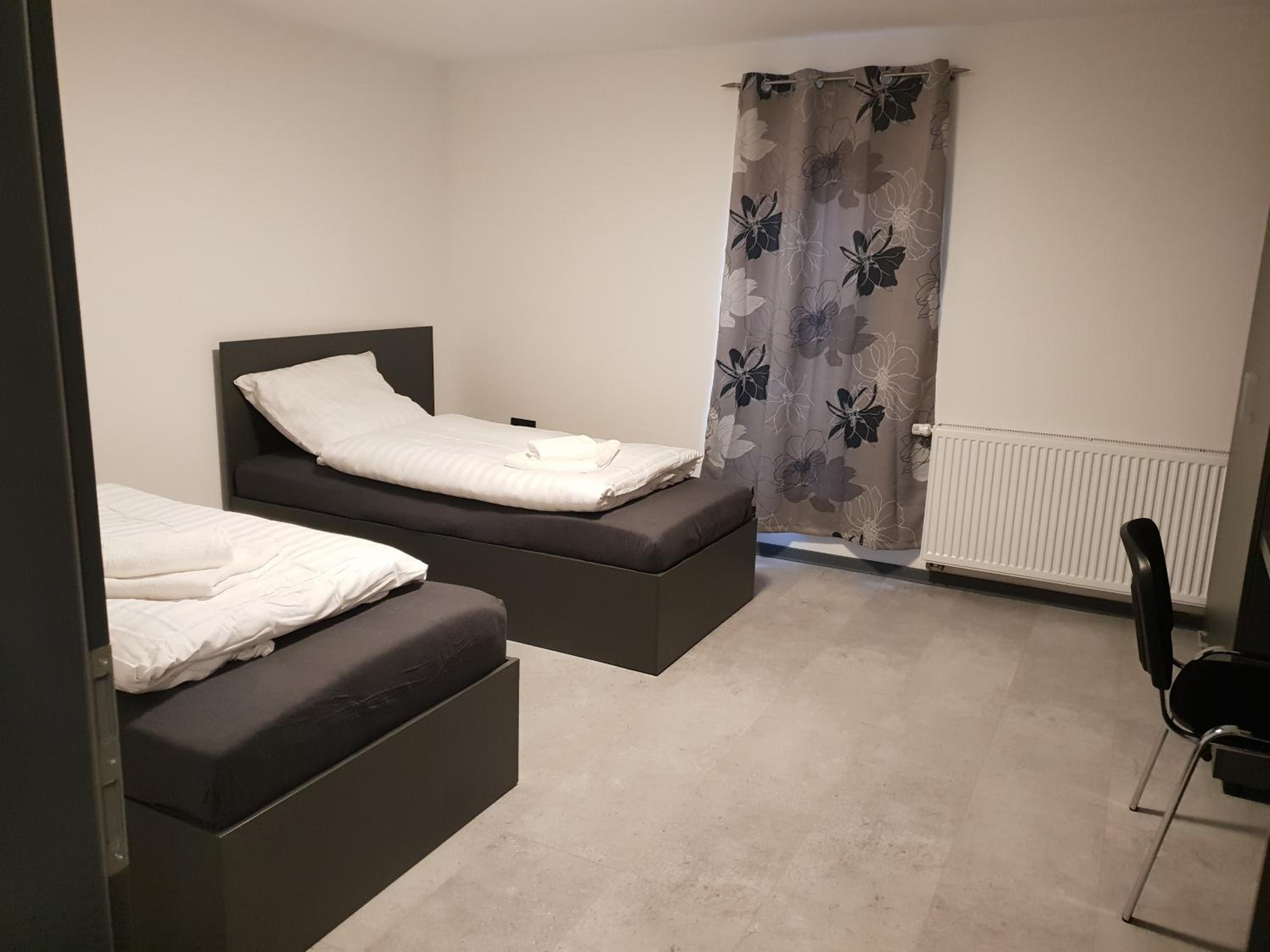 Three-Bedroom Apartment photo 1