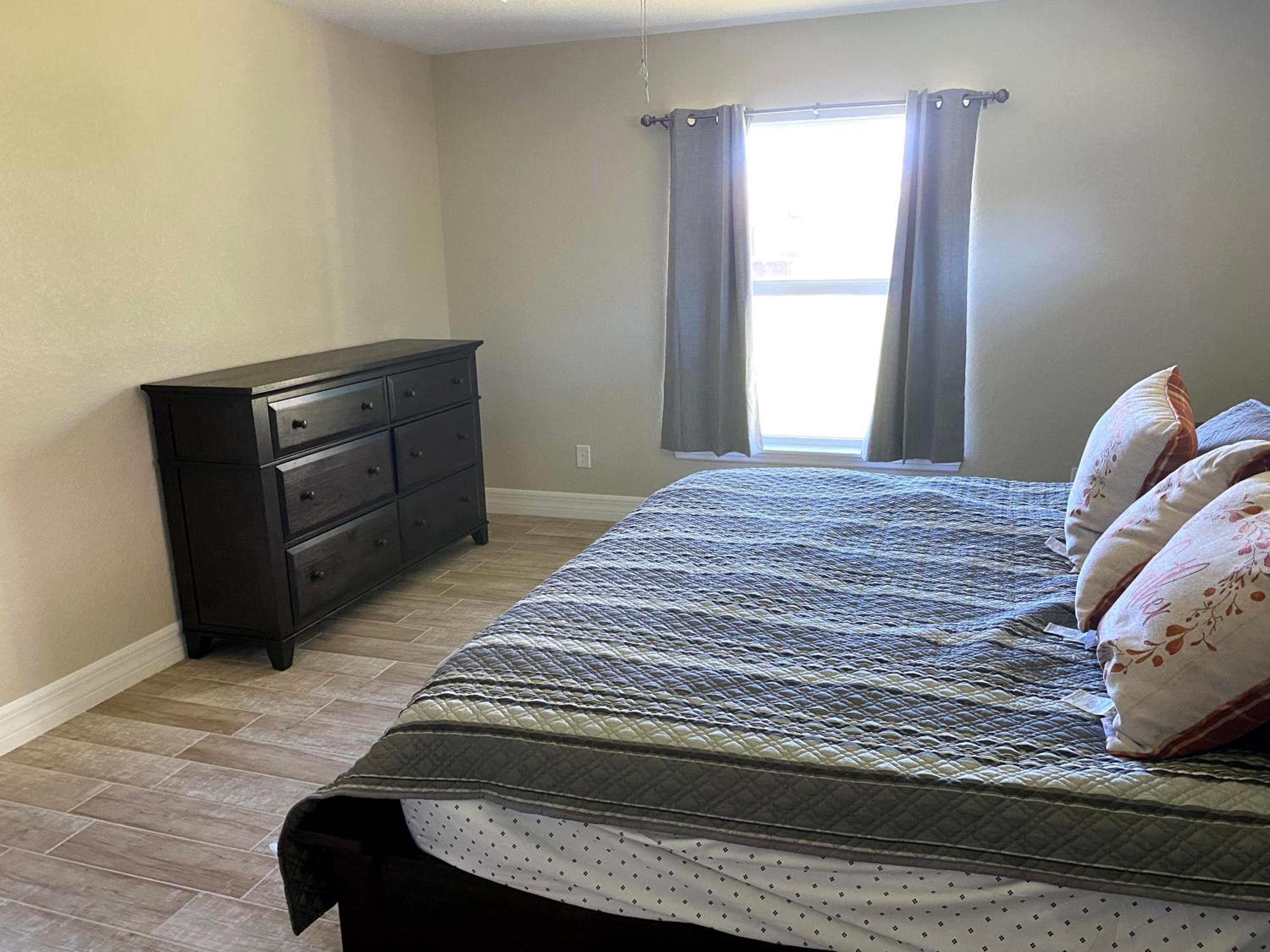 Three-Bedroom House - Photo 9