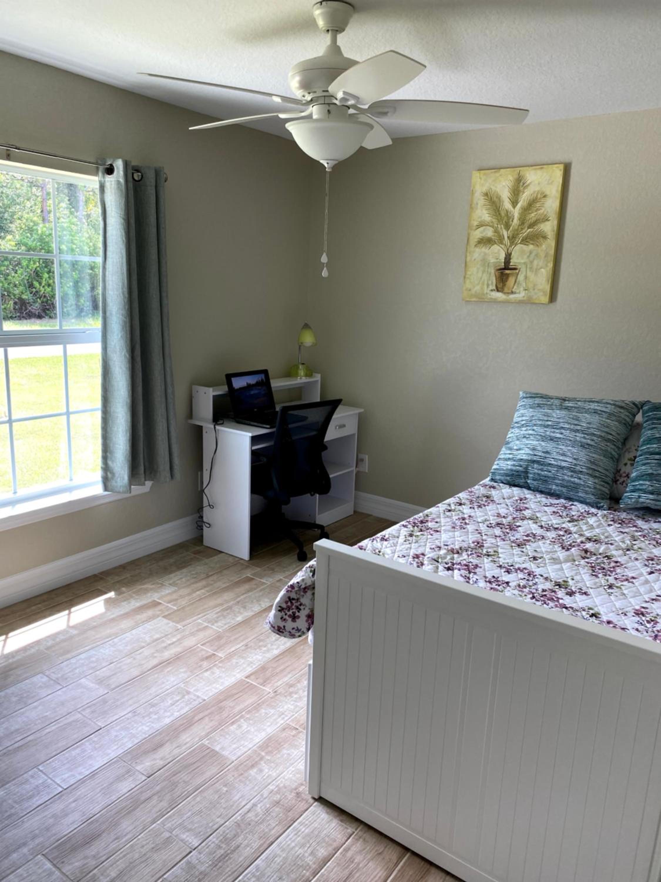 Three-Bedroom House - Photo 26