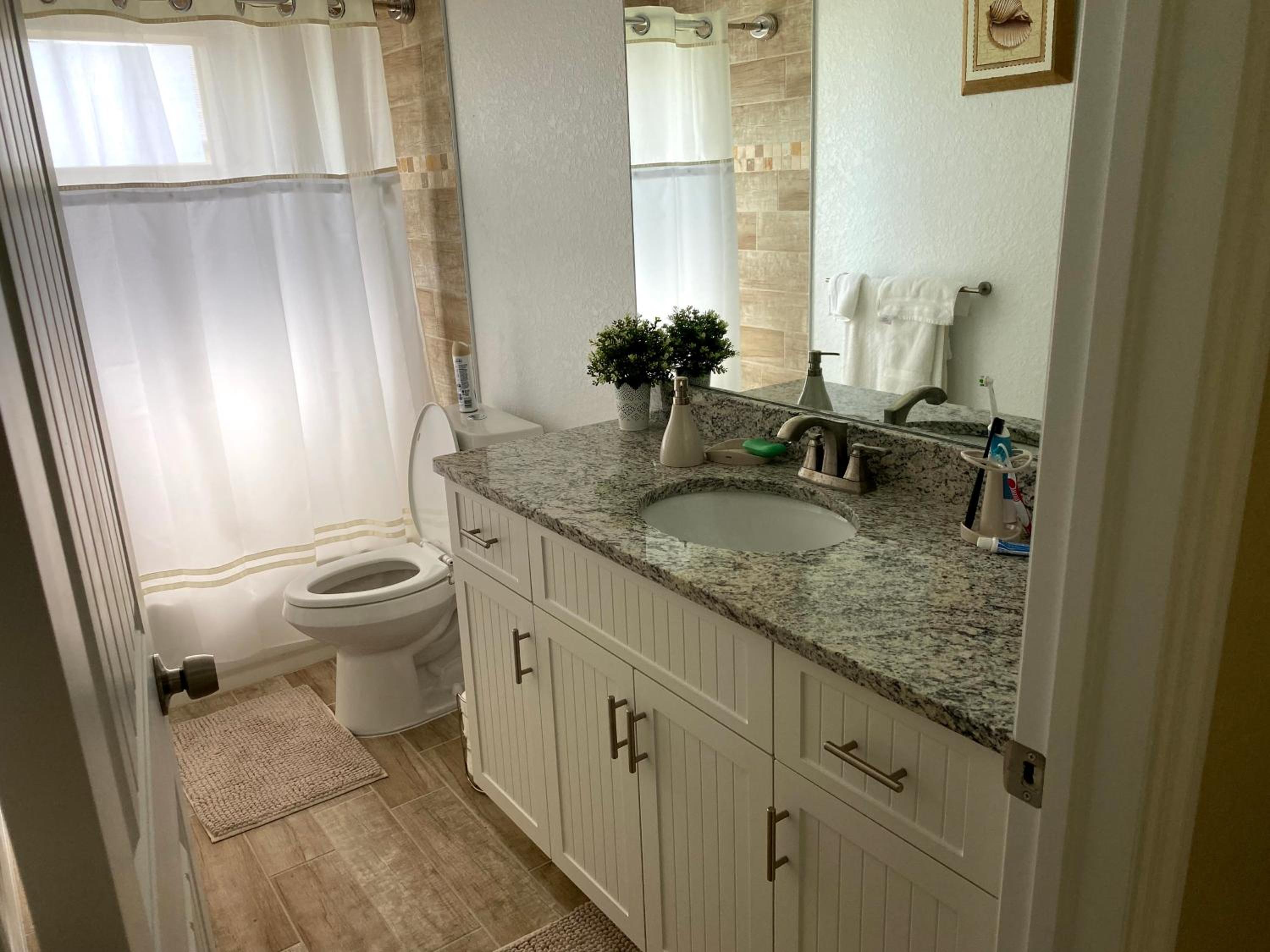 Three-Bedroom House - Photo 19