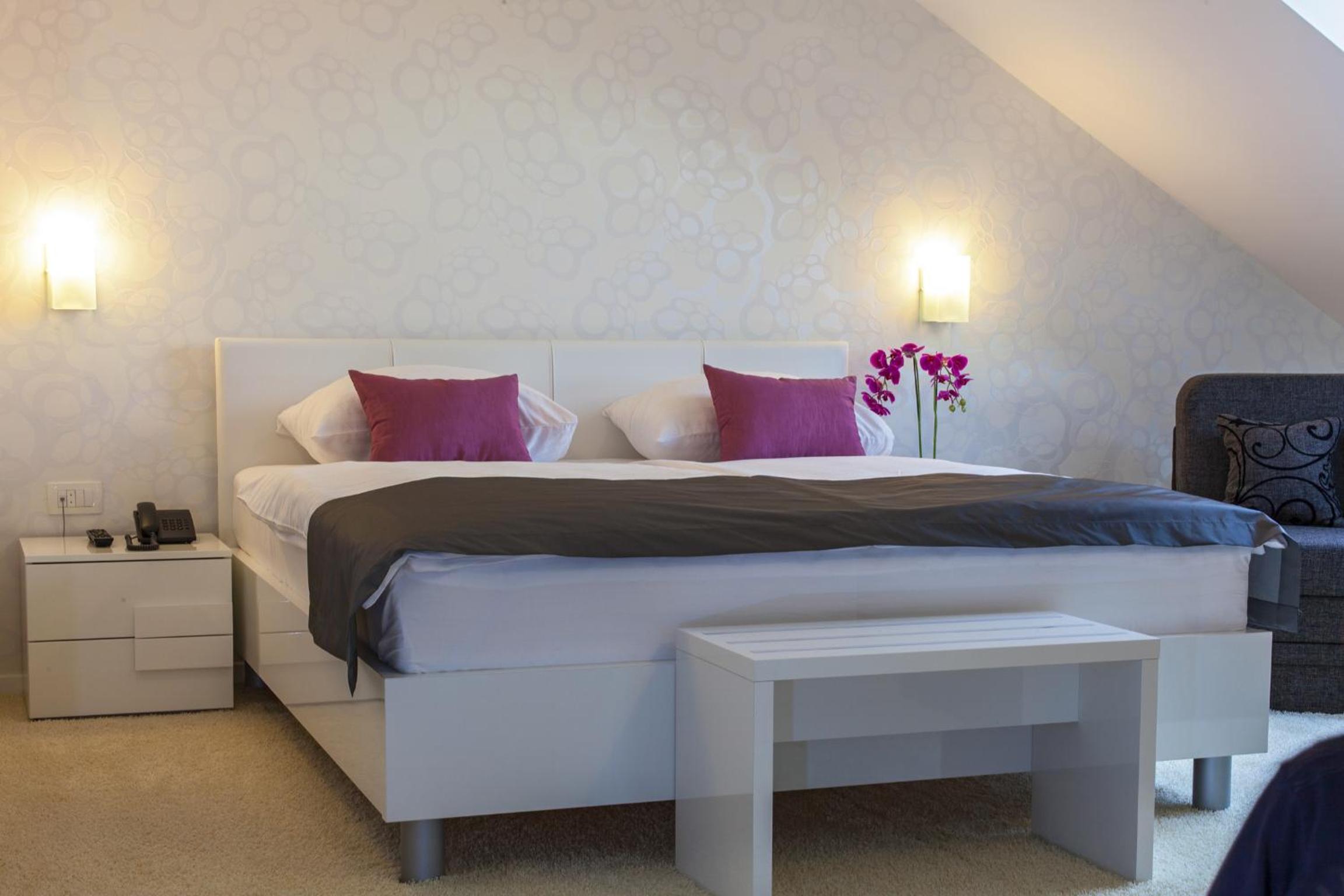 Luxury Suite with Side Sea View and Balcony