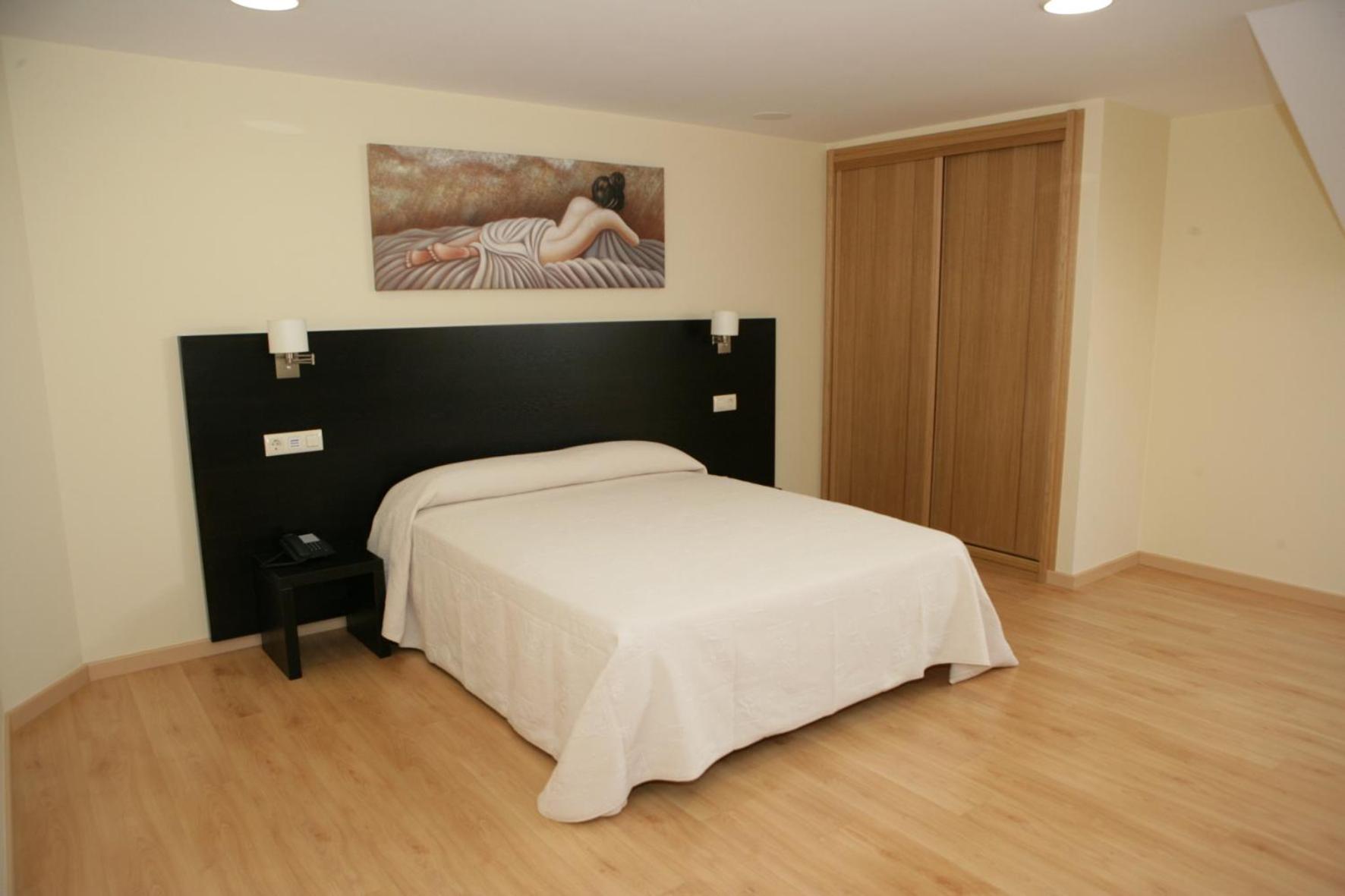 Habitación Estándar con Cama Queen