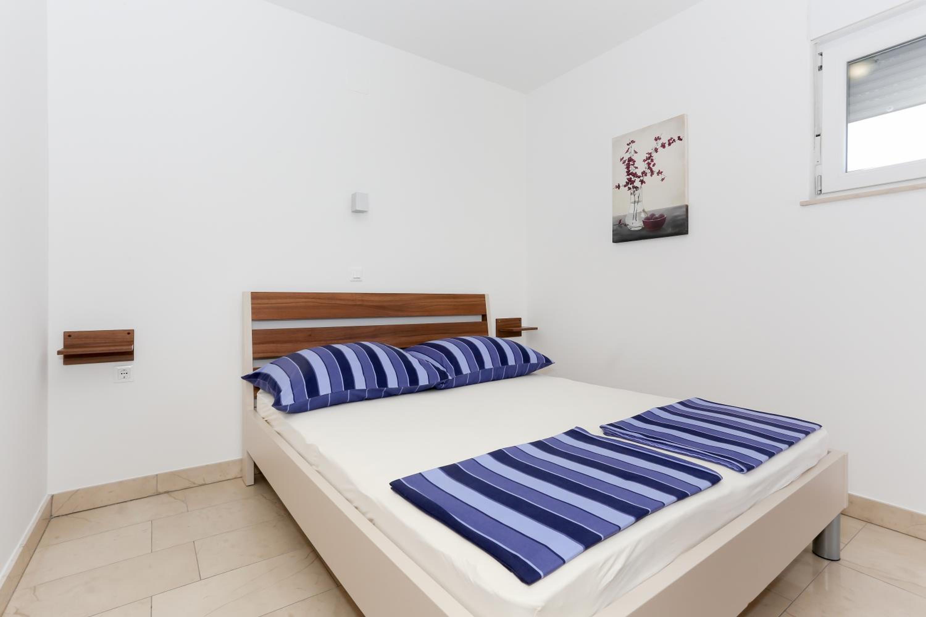 Appartamento con 1 Camera da Letto, Balcone e Vista Mare - 2° Piano