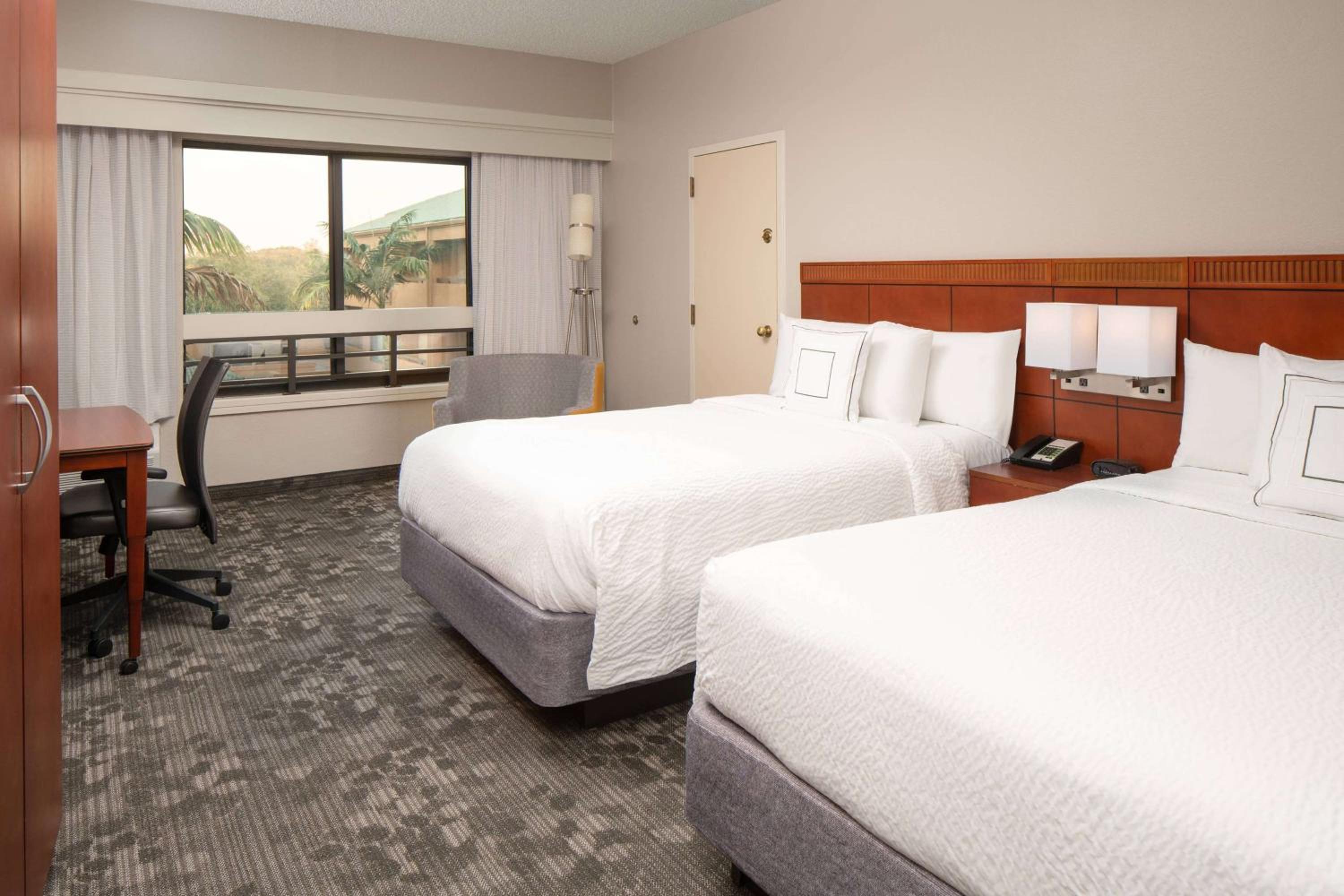 Deluxe Queen Room with Two Queen Beds - Photo 1