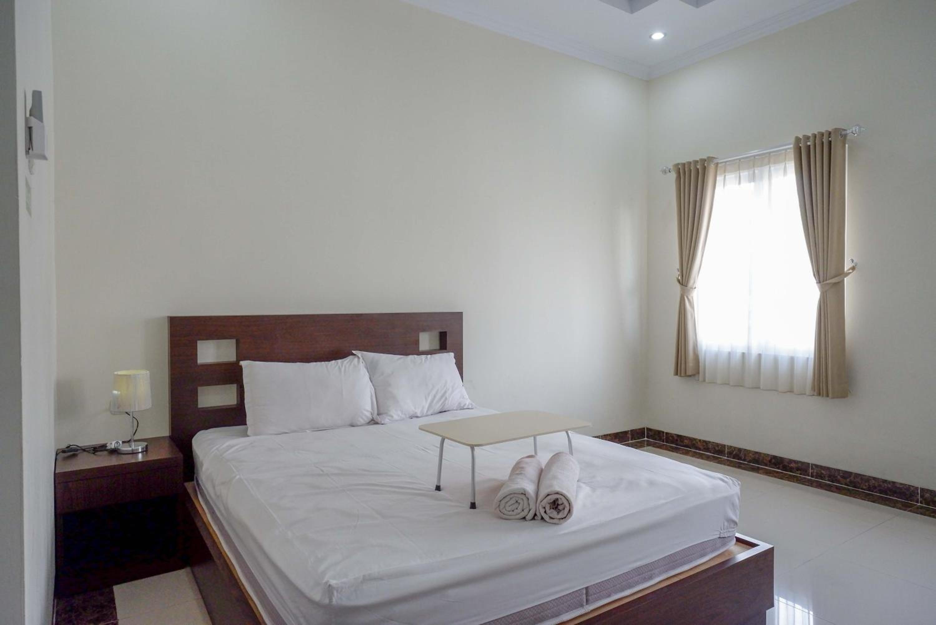 Deluxe Room - Photo 15