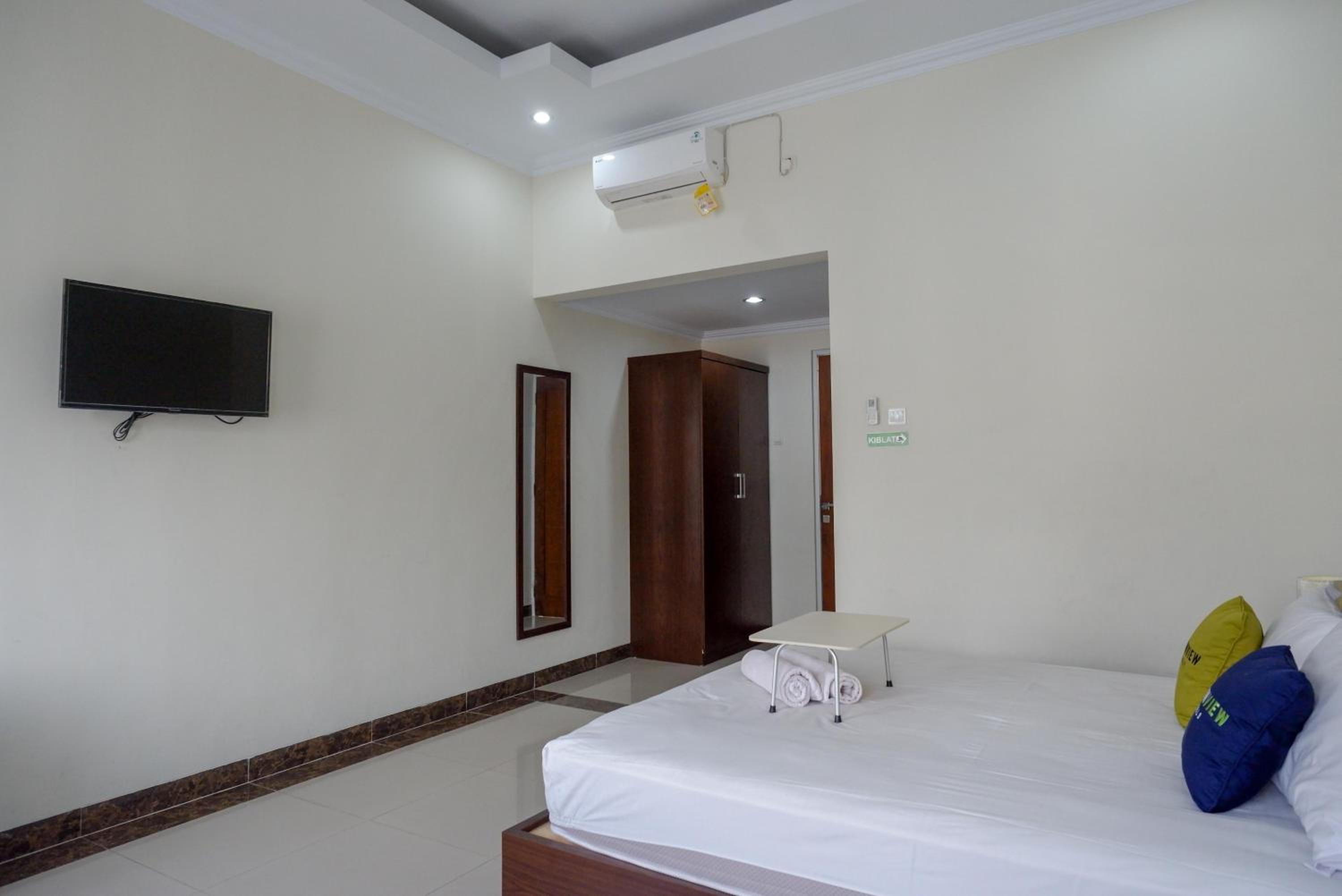 Deluxe Room - Photo 9