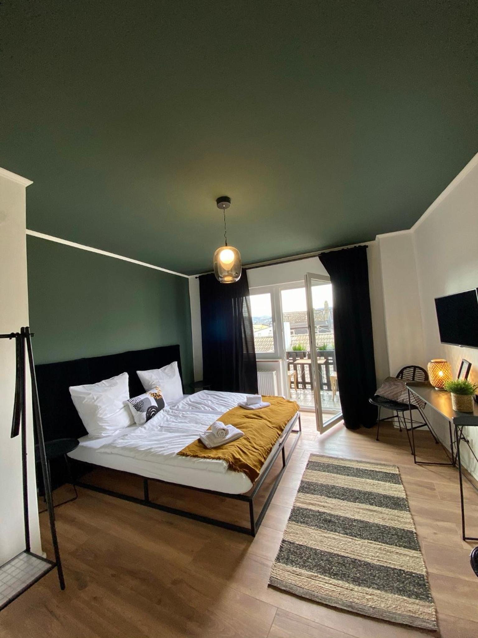 Deluxe Double Room with Balcony - Photo 1