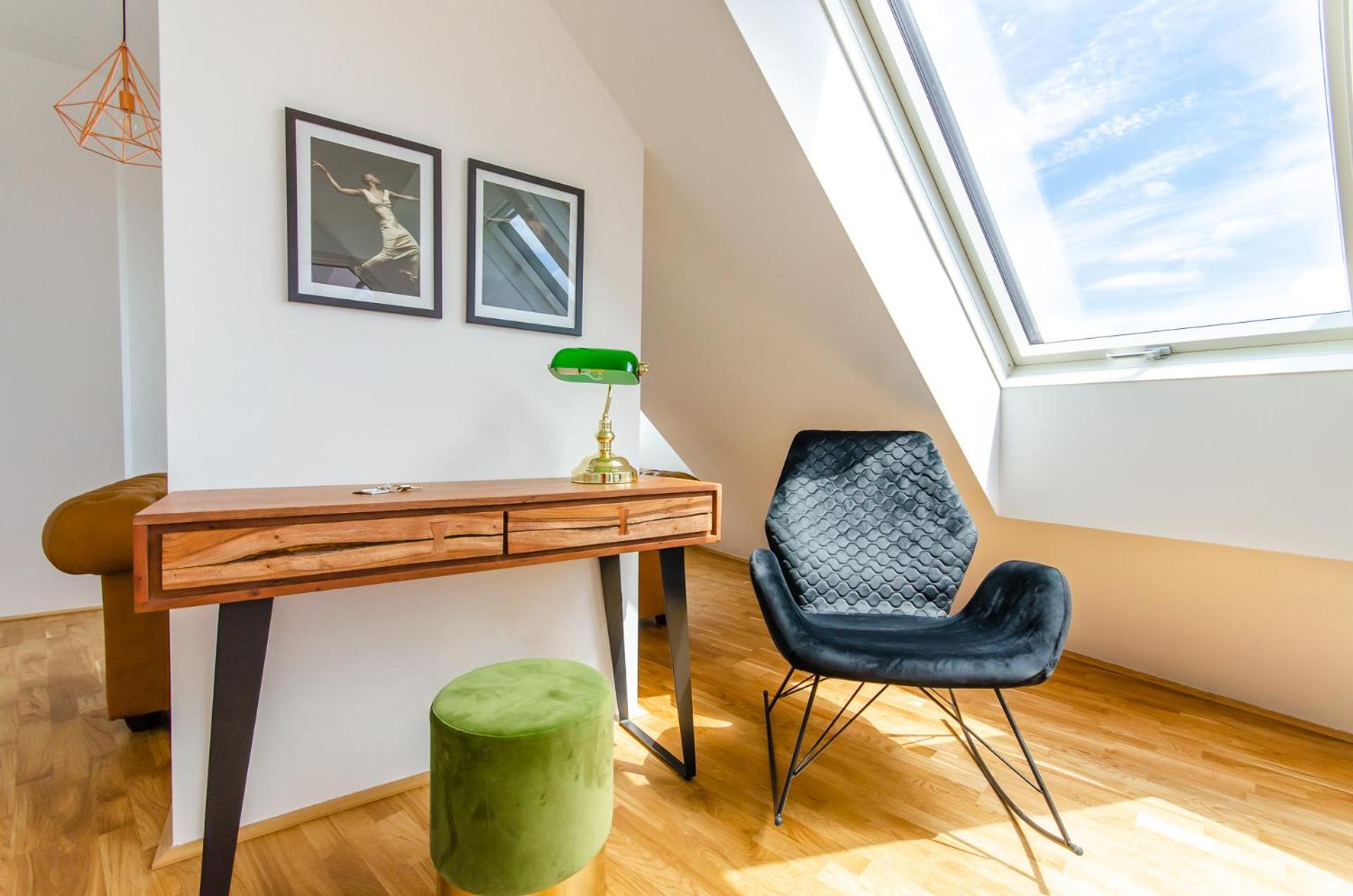One-Bedroom Apartment with Balcony and City View