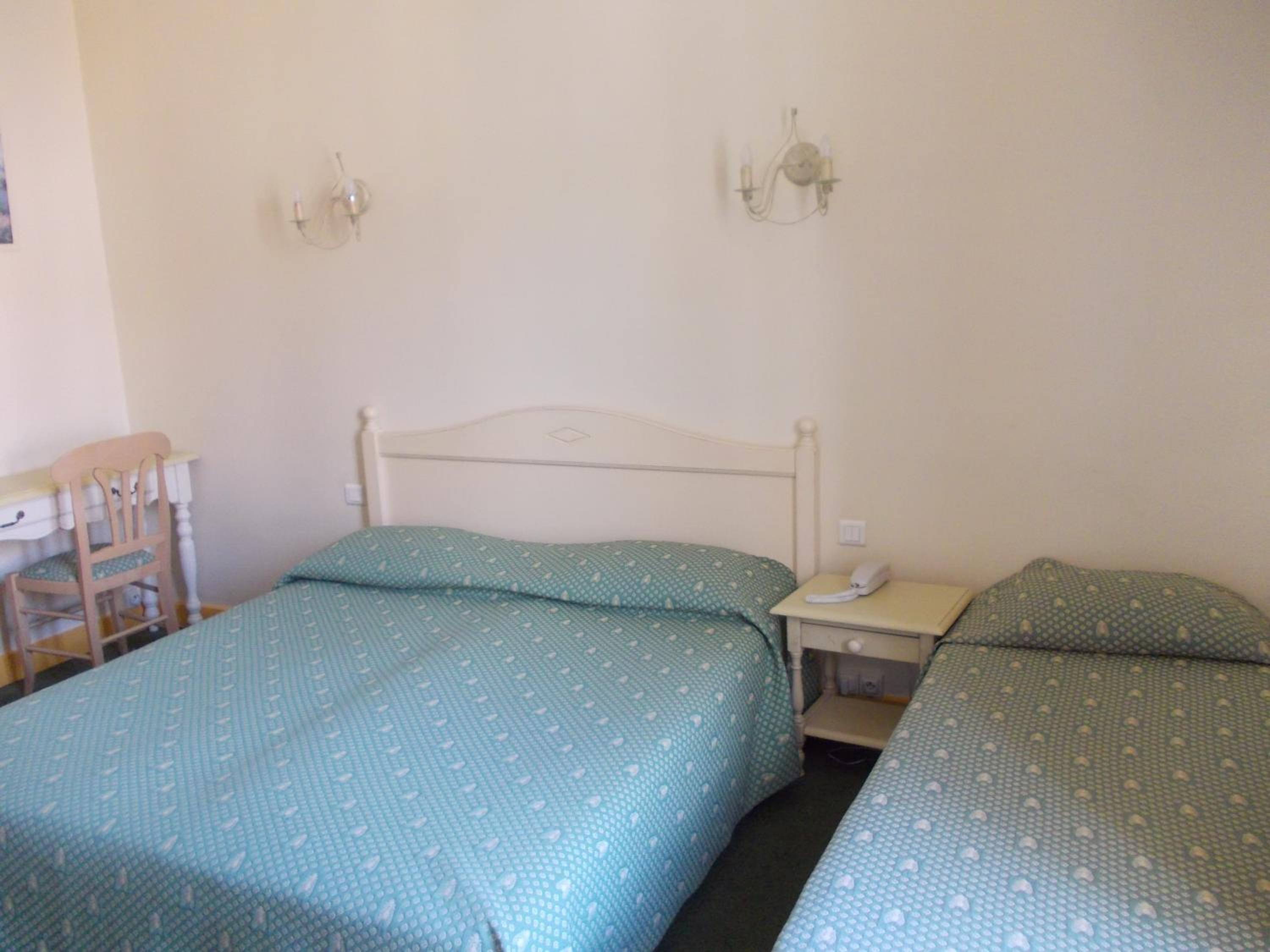 Triple Room (2 Adults + 1 Child) photo 3