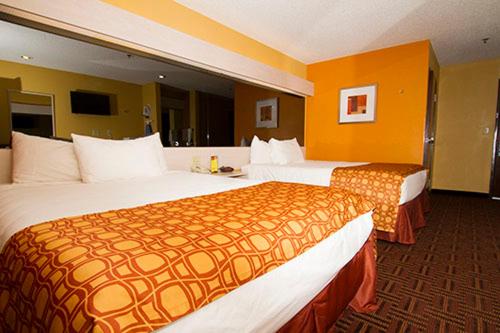 Queen Room with Two Queen Beds - Smoking photo 1