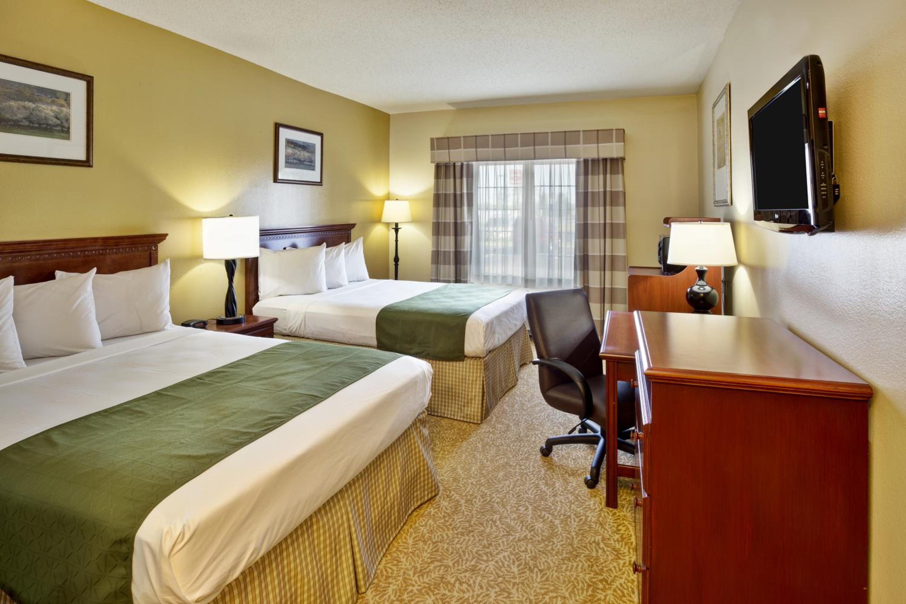 Queen Room with Two Queen Beds - Photo 1