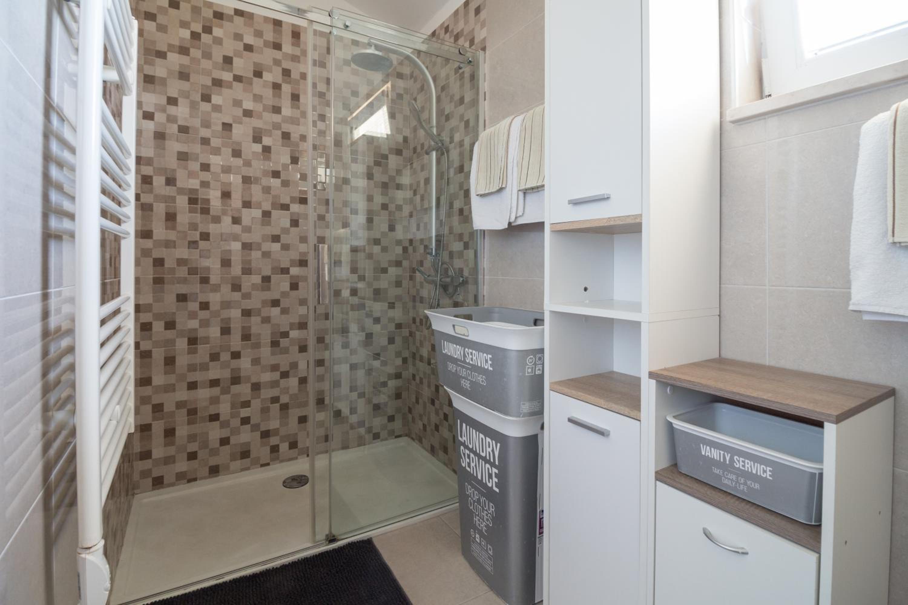 Digital Nomads Package - Two-Bedroom Apartment with Free Airport Shuttle & Office Equipment photo 3