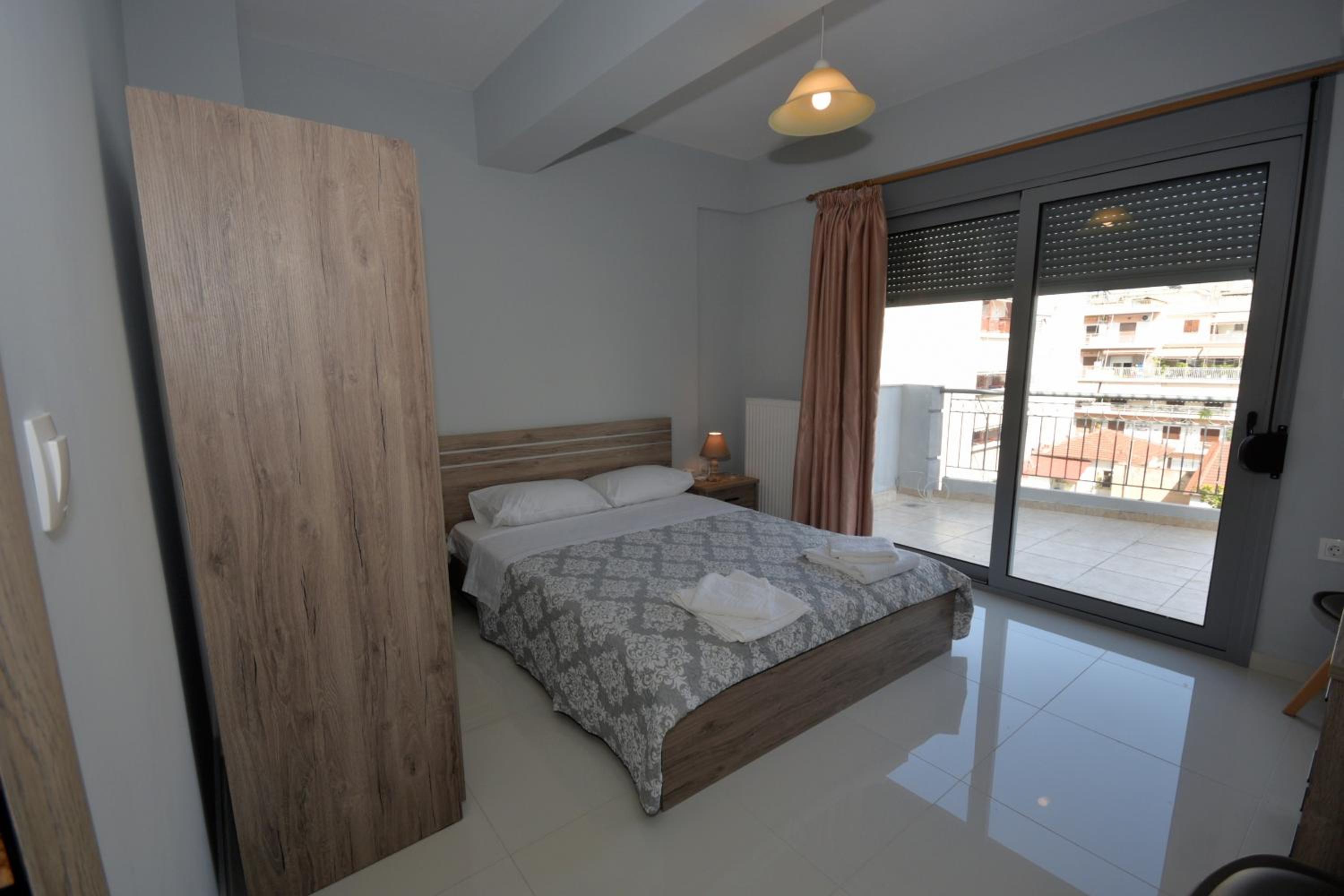Deluxe Queen Room with Two Queen Beds - Photo 1