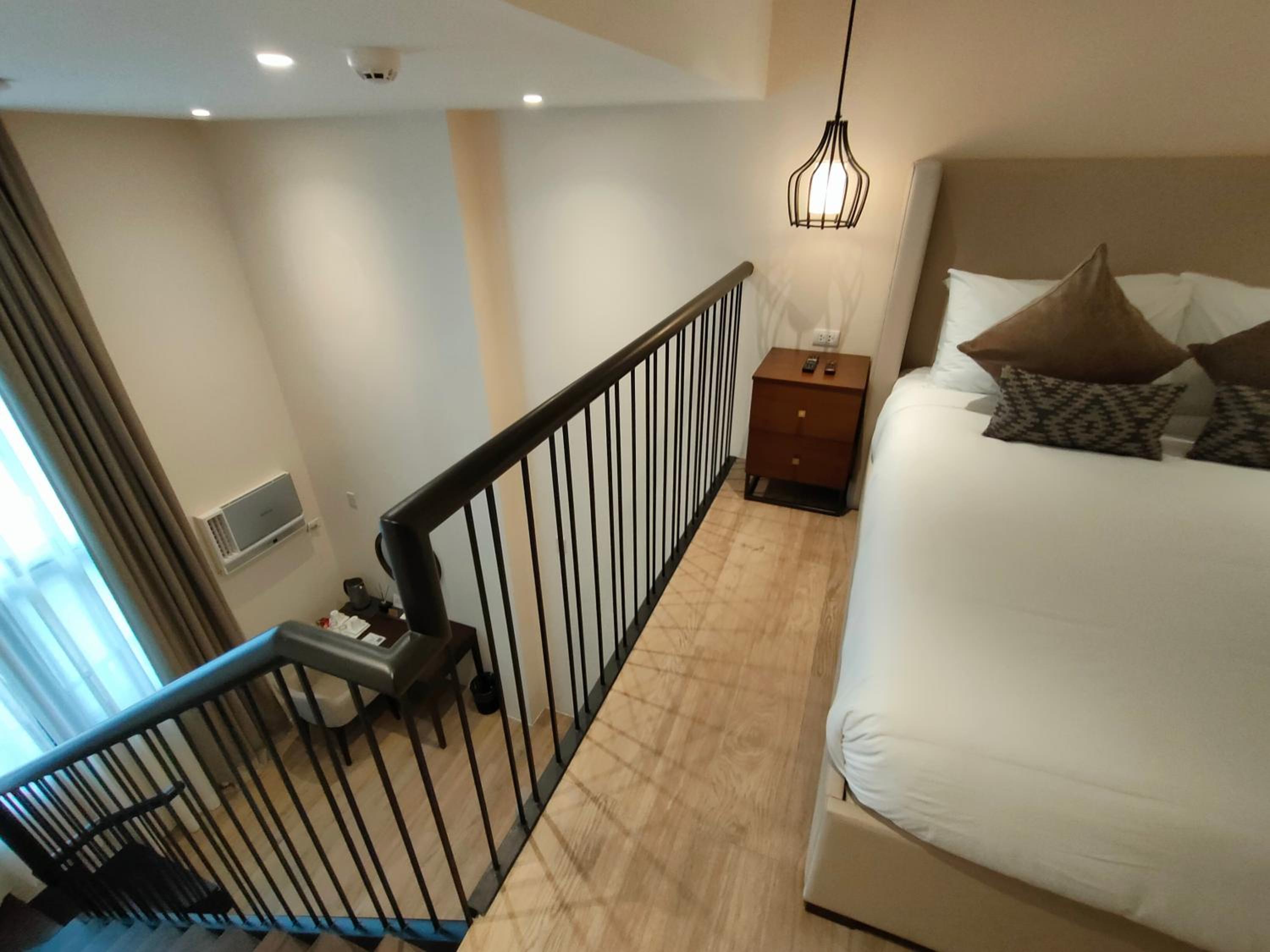 Deluxe Queen Room - Photo 7