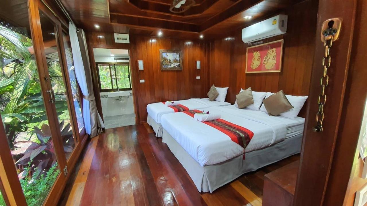 Deluxe Triple Room - Photo 7