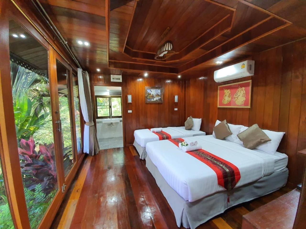 Deluxe Triple Room - Photo 1