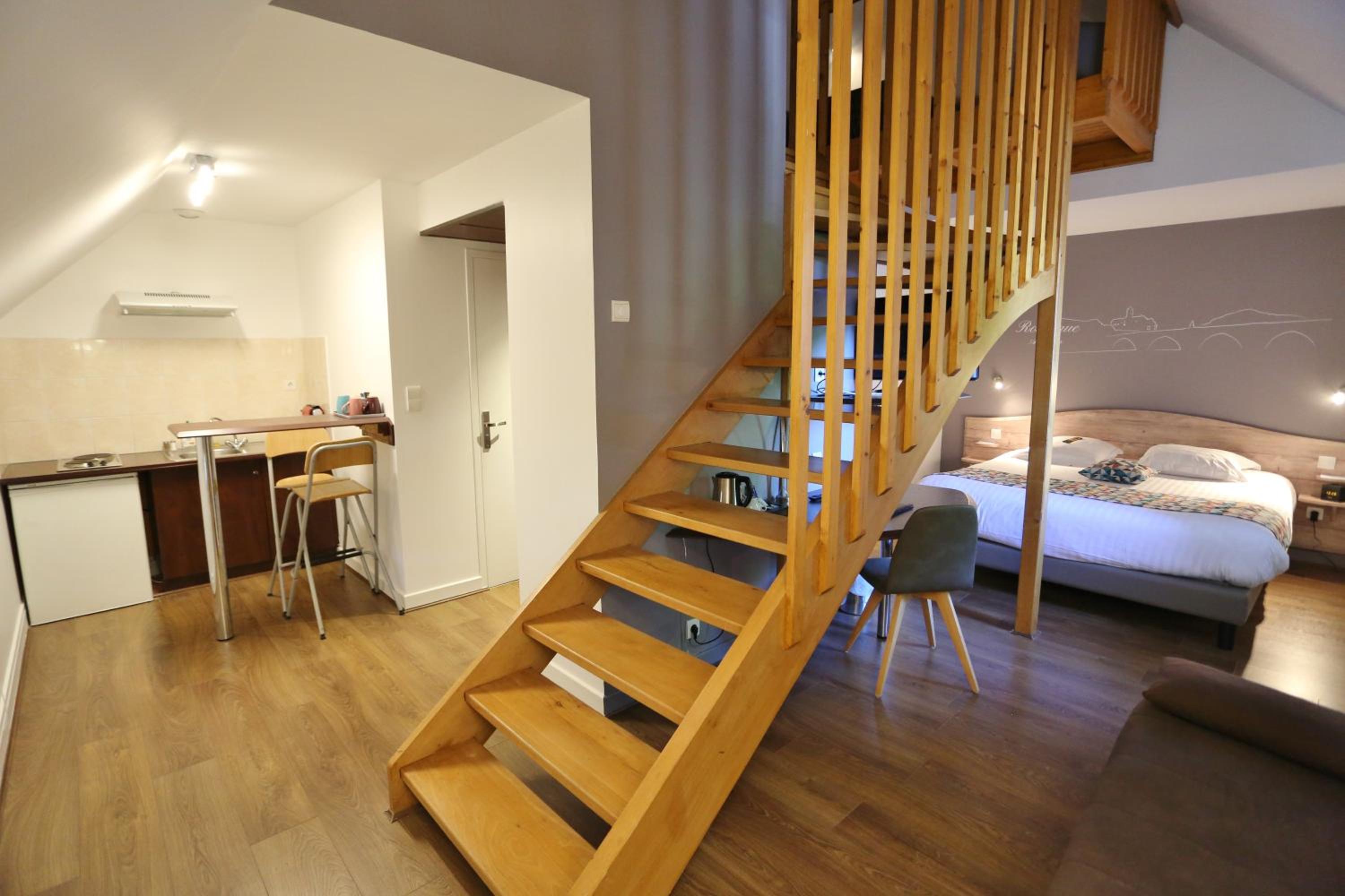 Family Room with 1 Double and 2 Twin Beds and Kitchen - Photo 6