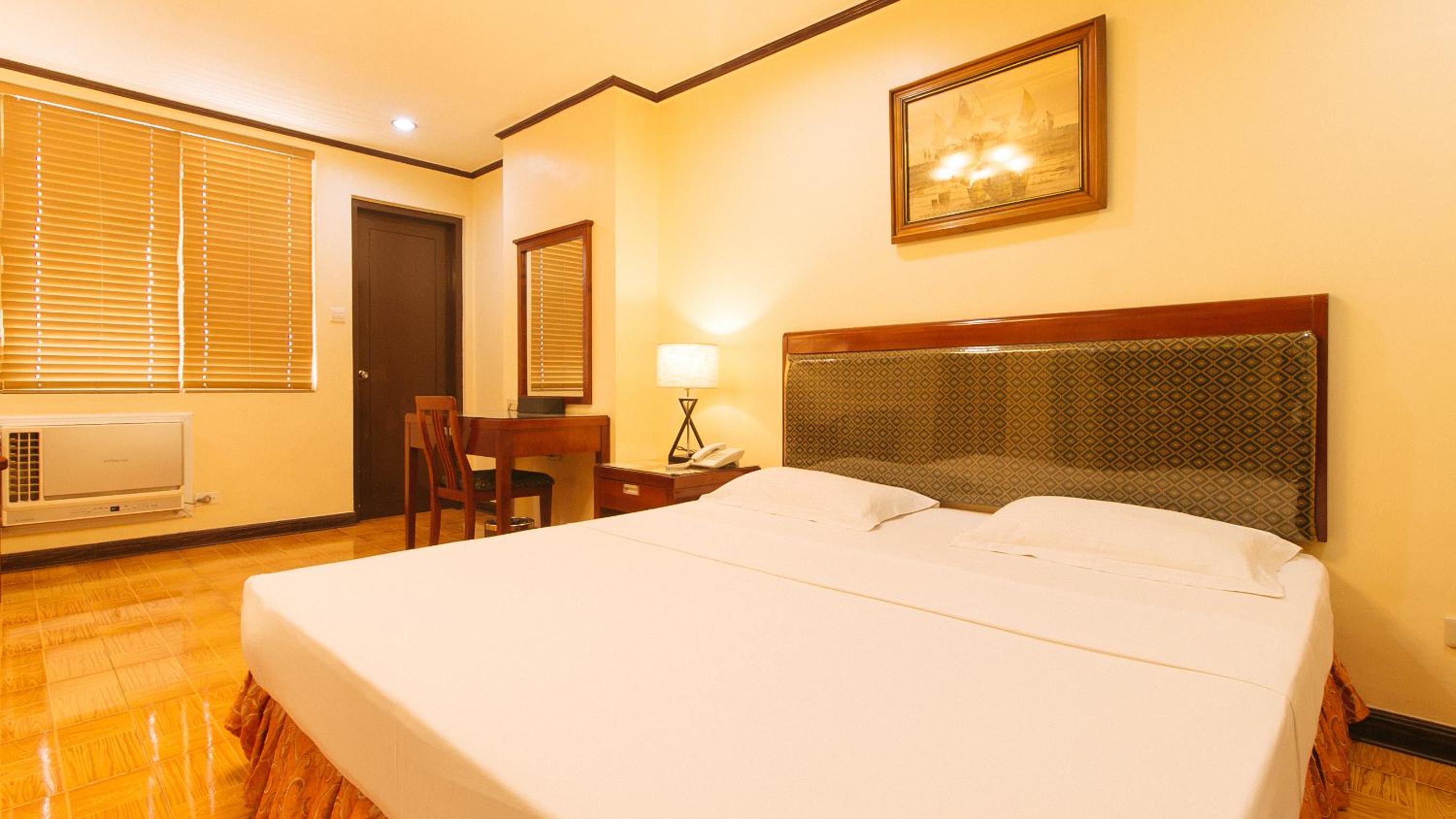 Deluxe Room - Photo 7