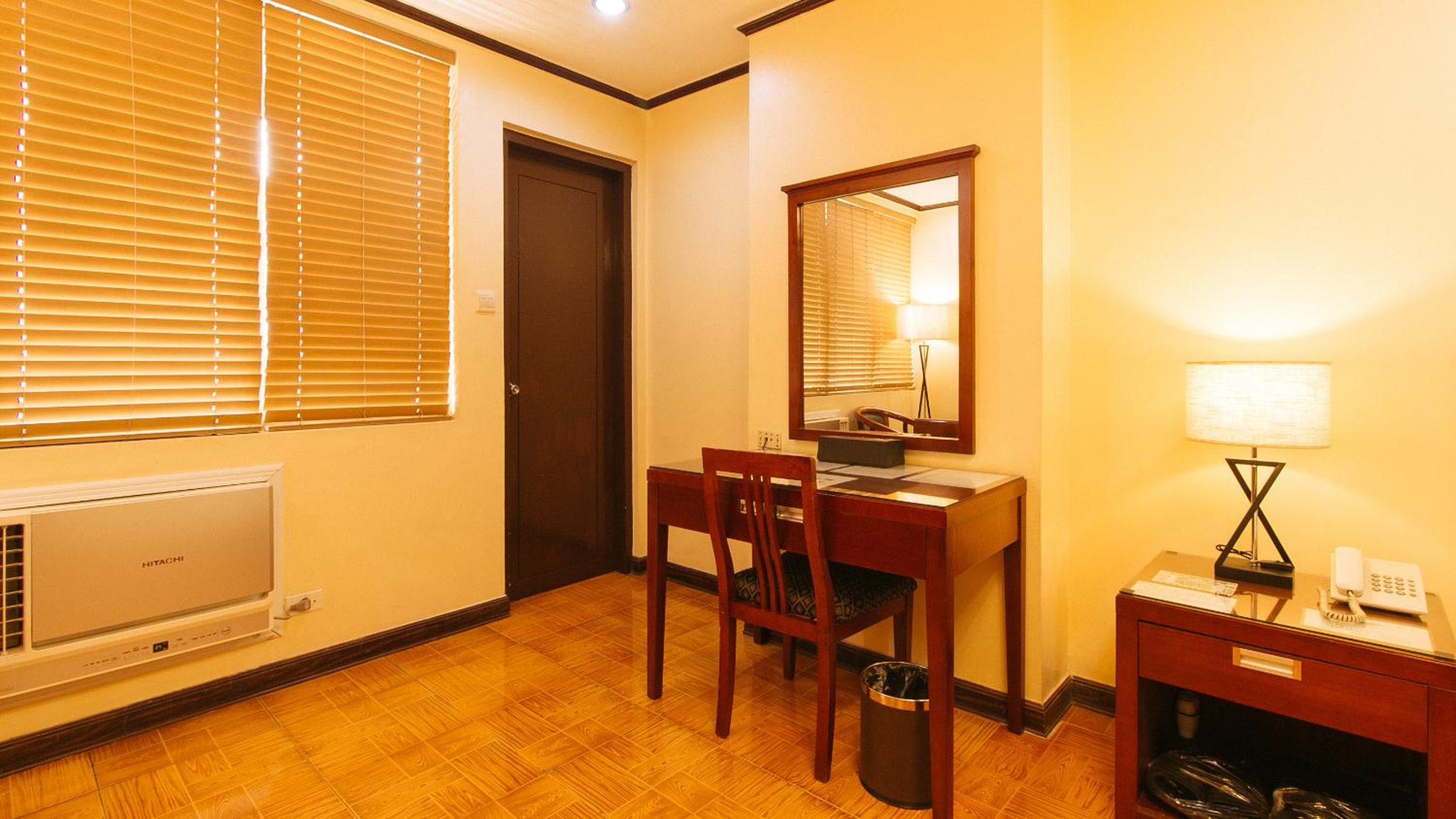 Deluxe Room - Photo 11