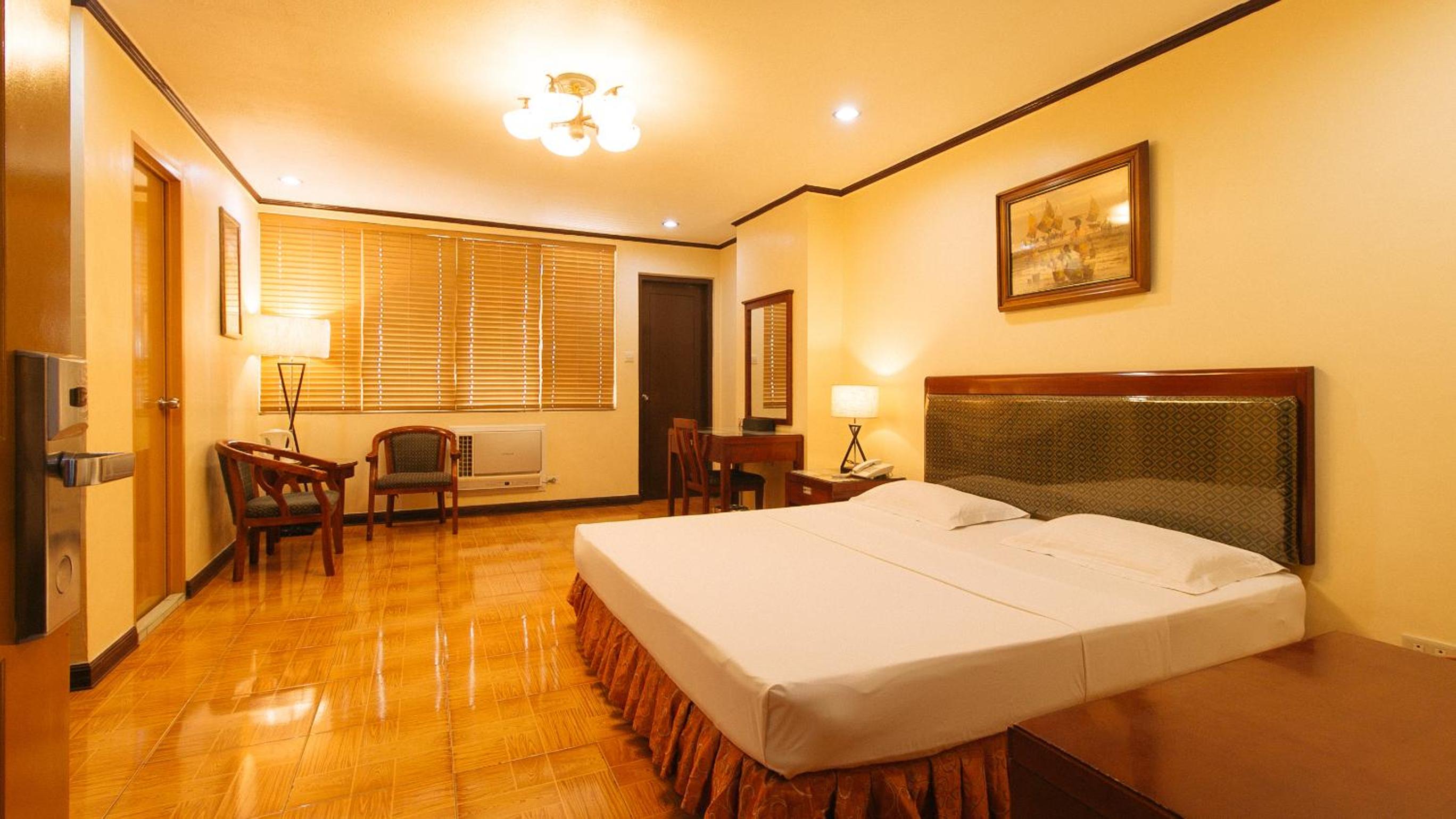 Deluxe Room - Photo 2