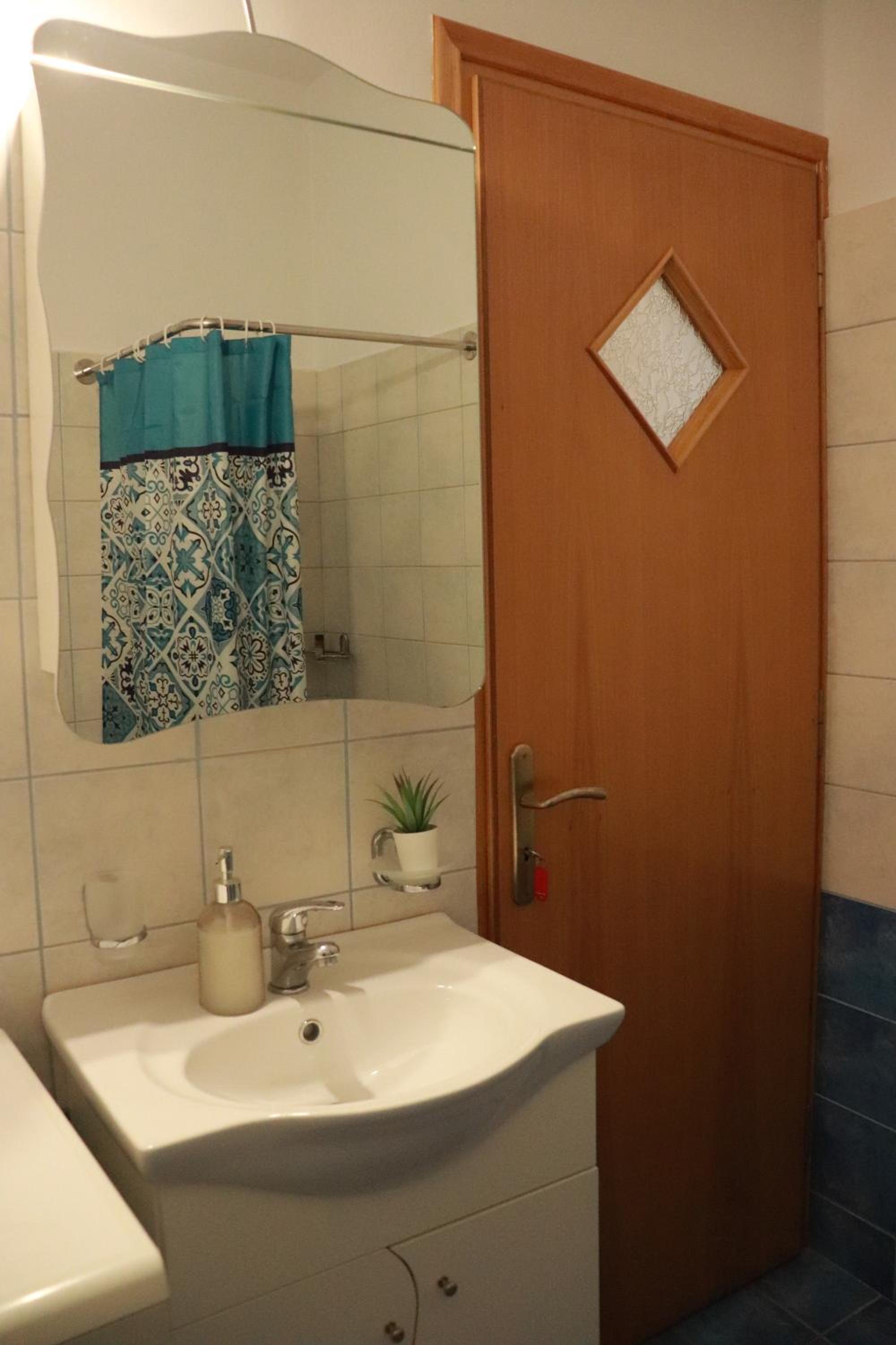 Two-Bedroom Apartment - Photo 12