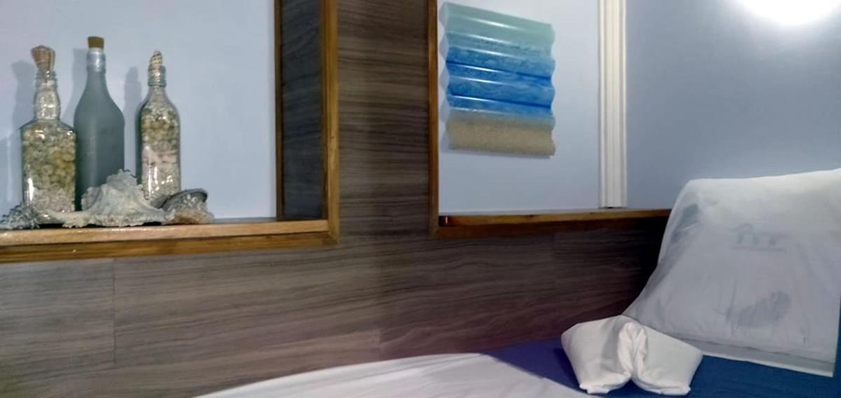 Deluxe Quadruple Room - Photo 9