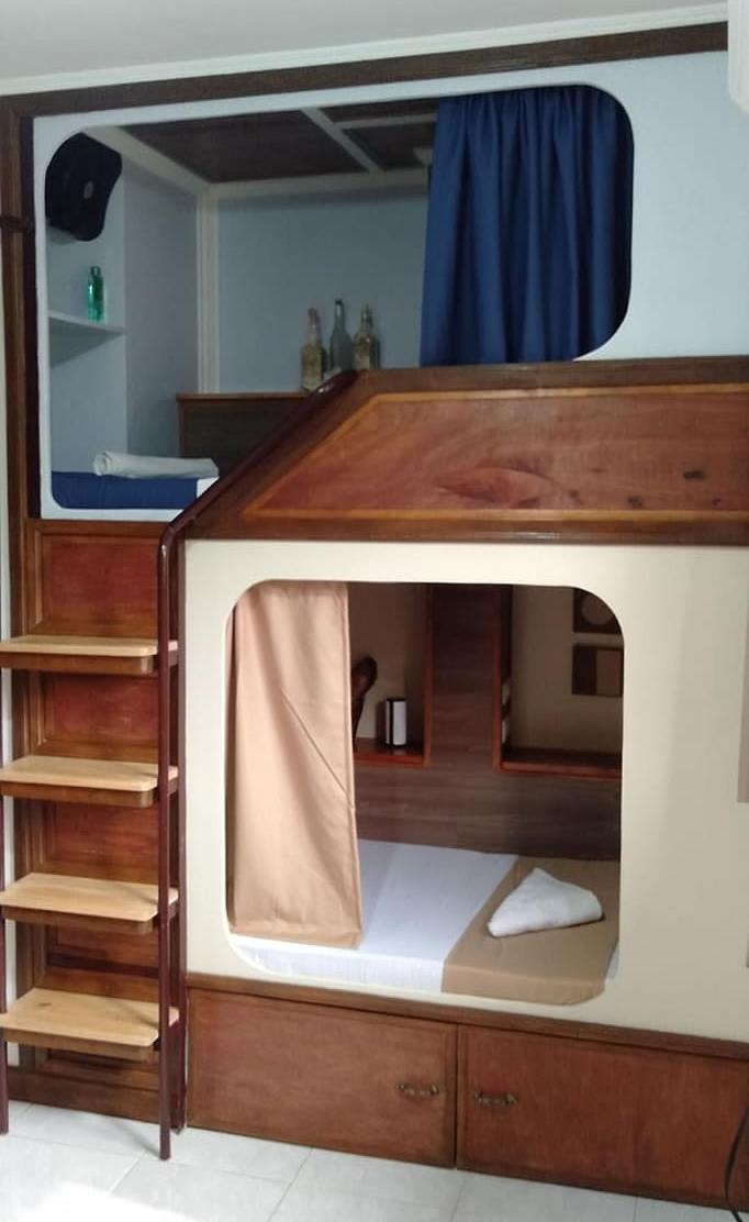 Deluxe Quadruple Room - Photo 19