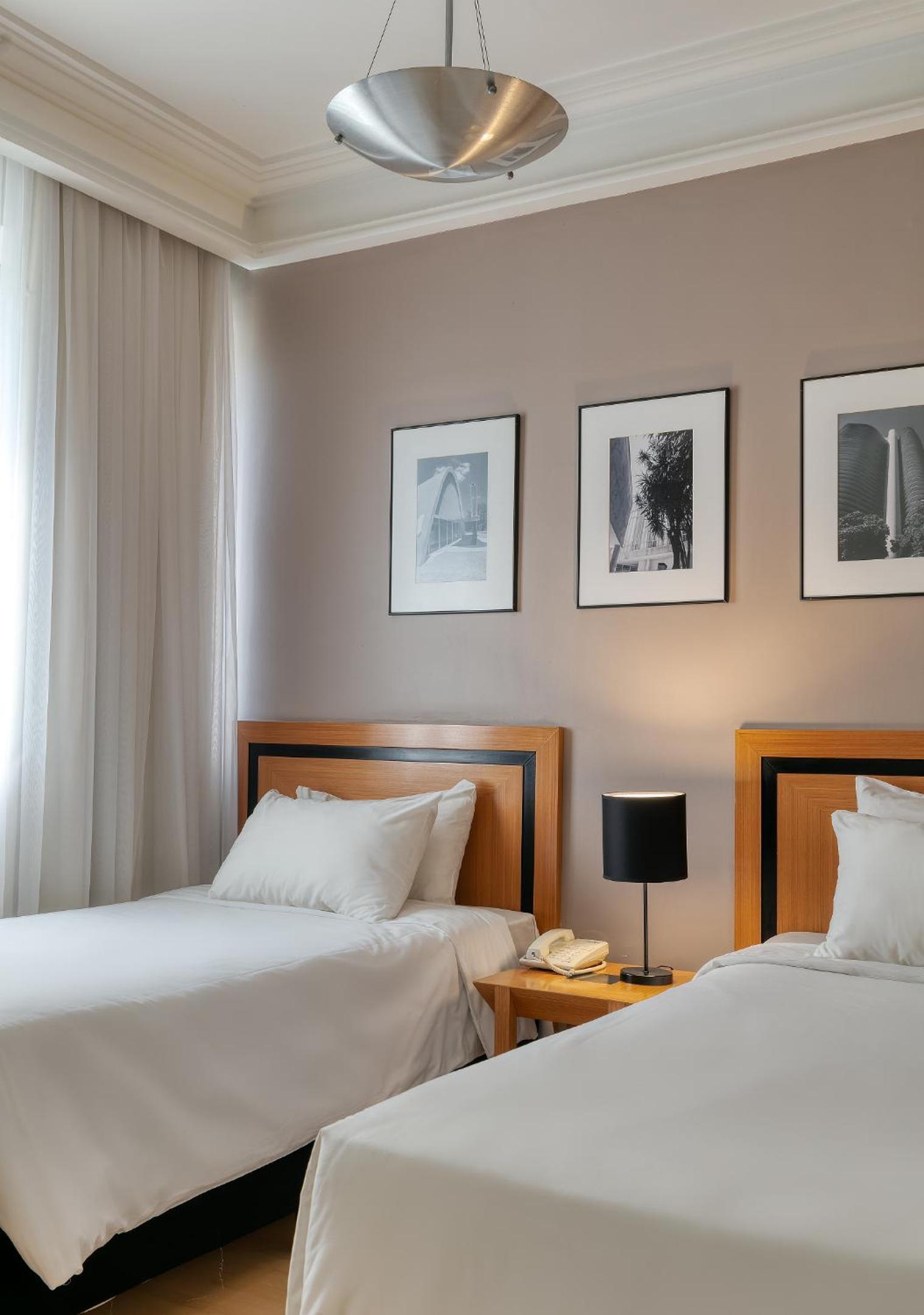 Standard Twin Room - Photo 6