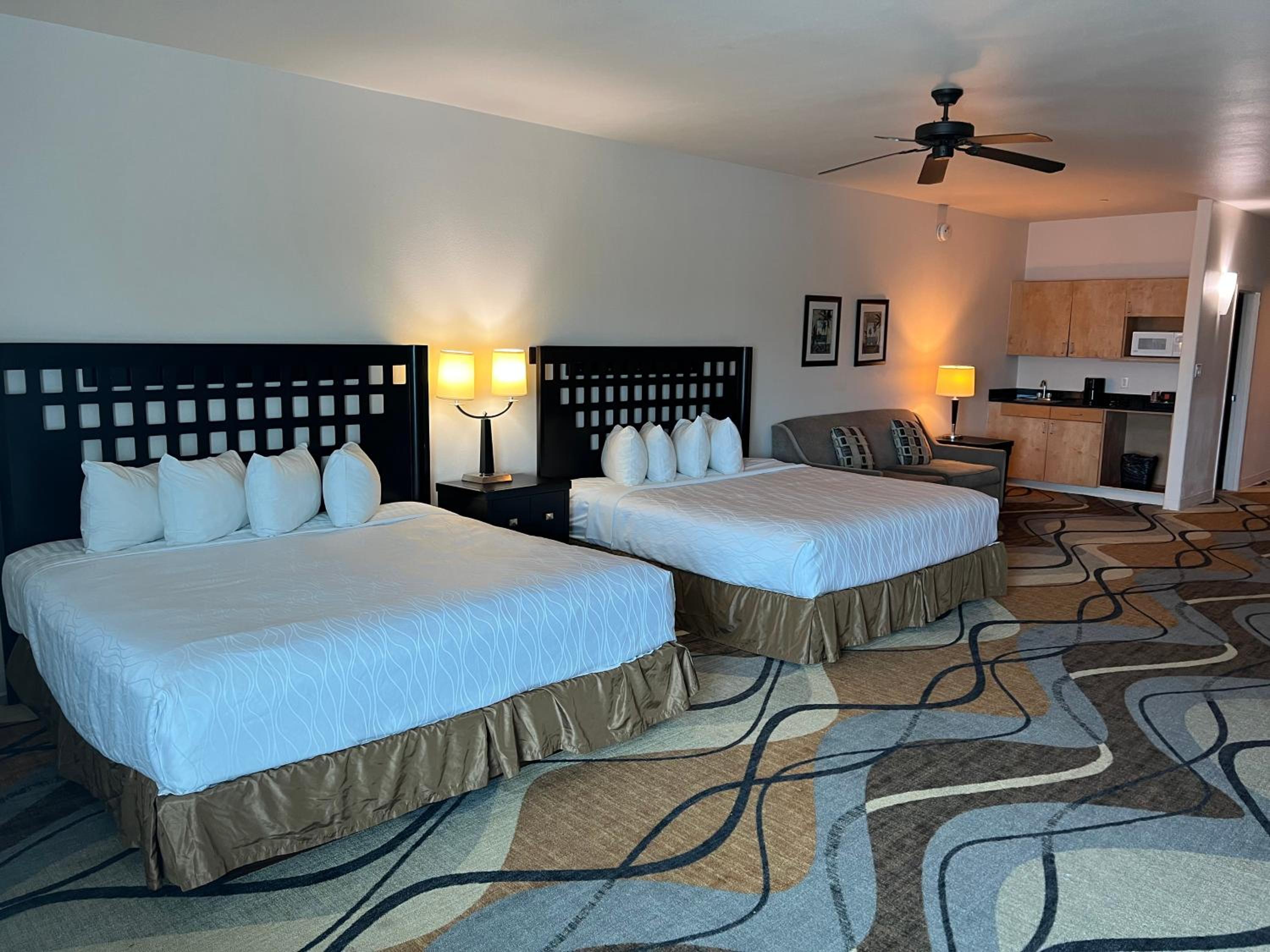 King Suite with Two King Beds and Sofa Bed  - Photo 1