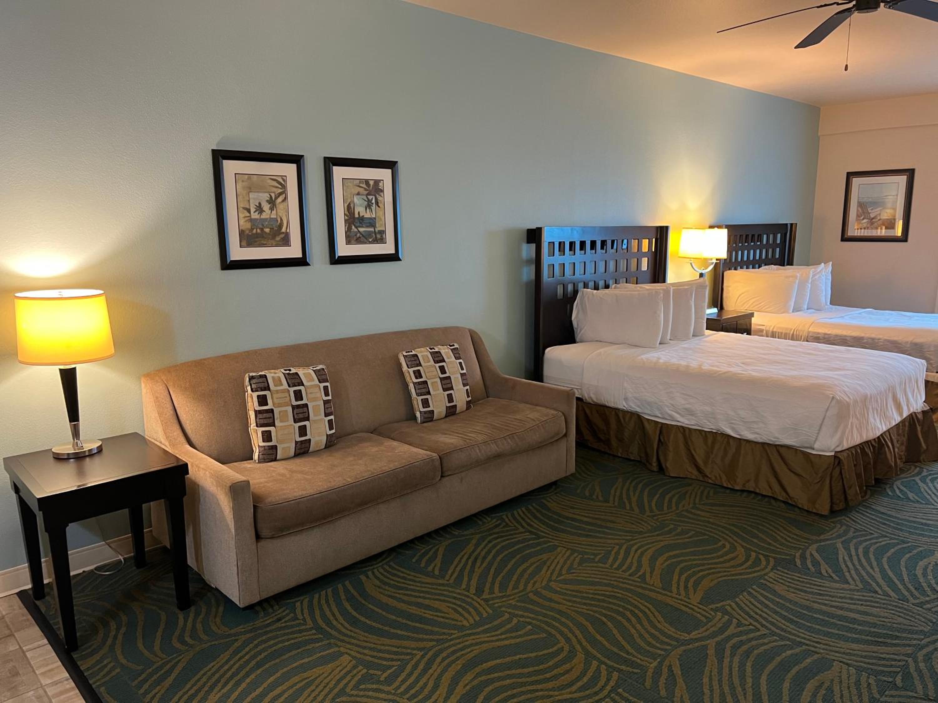 Queen Suite with Two Queen Beds and Sofa Bed - Photo 11