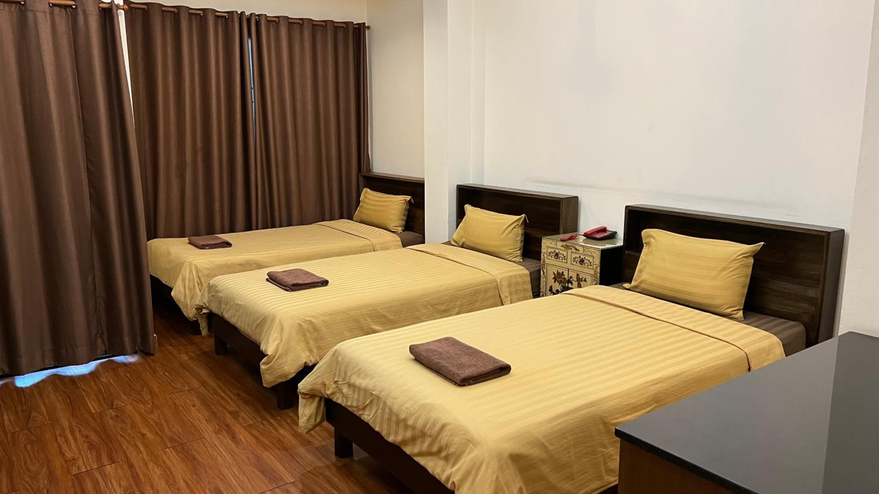 Triple Room with Balcony - Photo 7