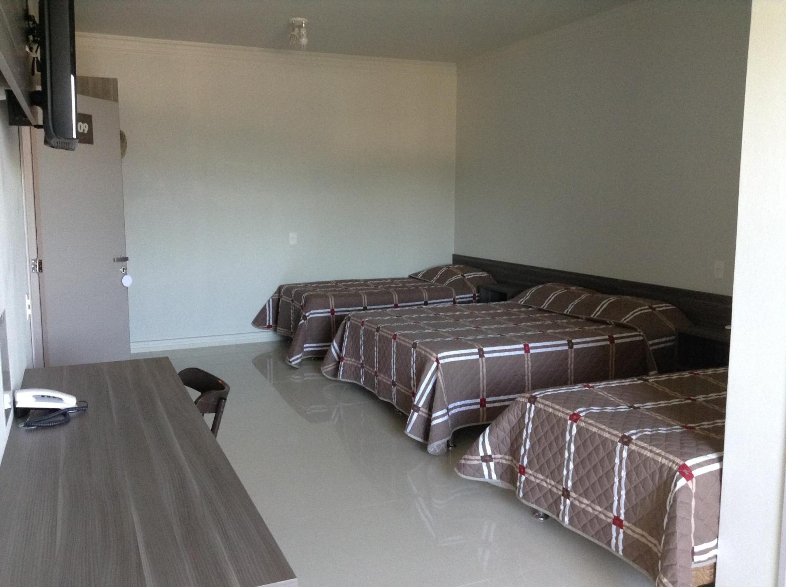 Deluxe Triple Room - Photo 1