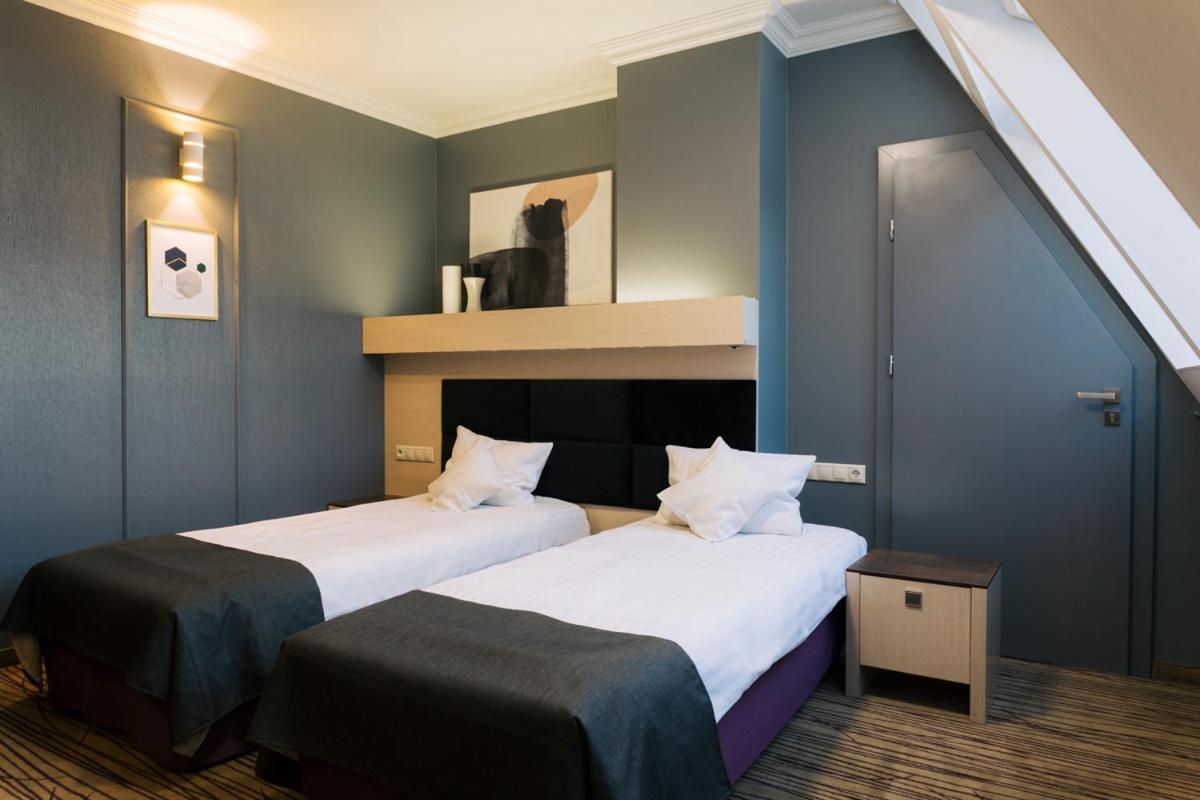 Standard Twin Room - Photo 4