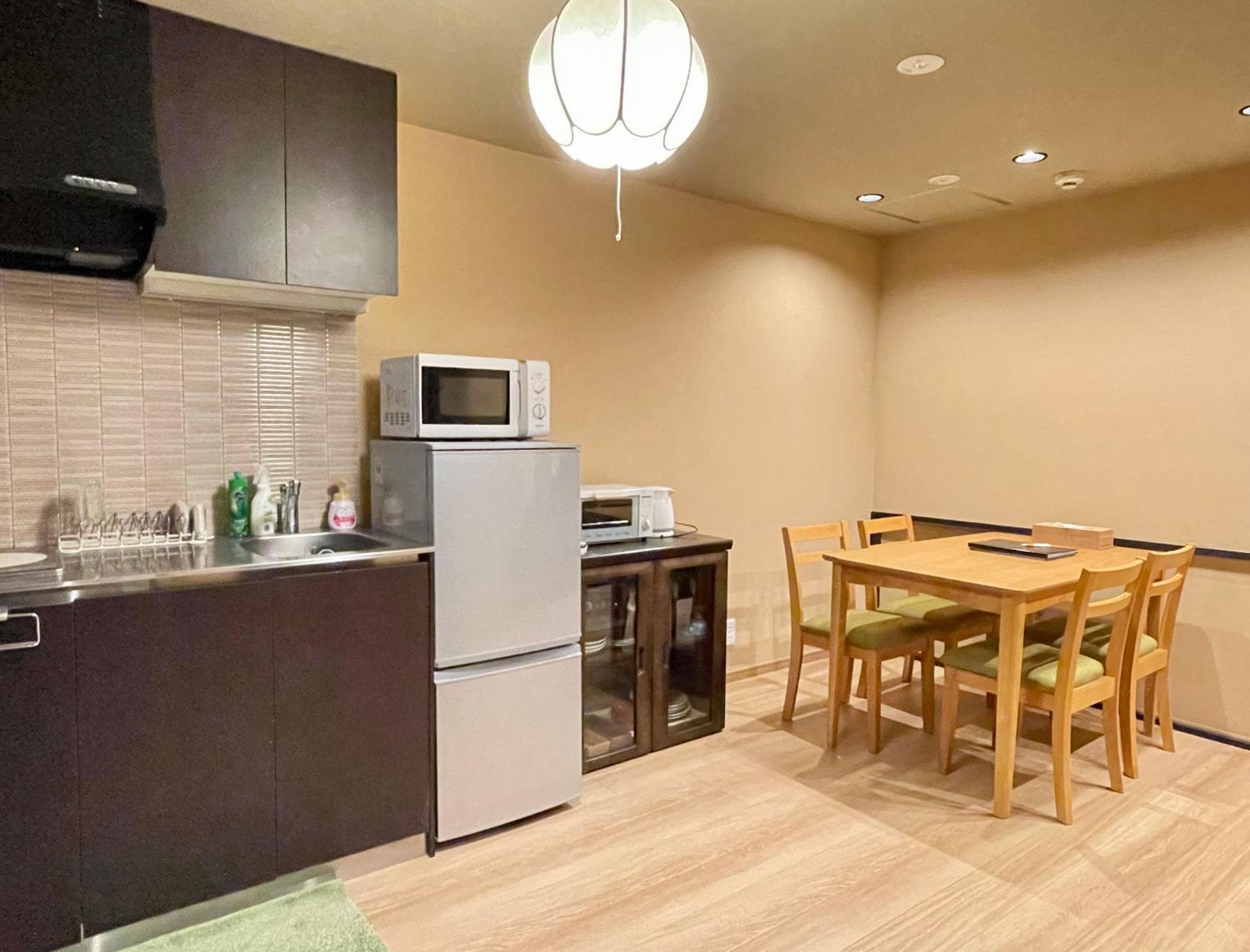 Three-Bedroom House - Photo 29
