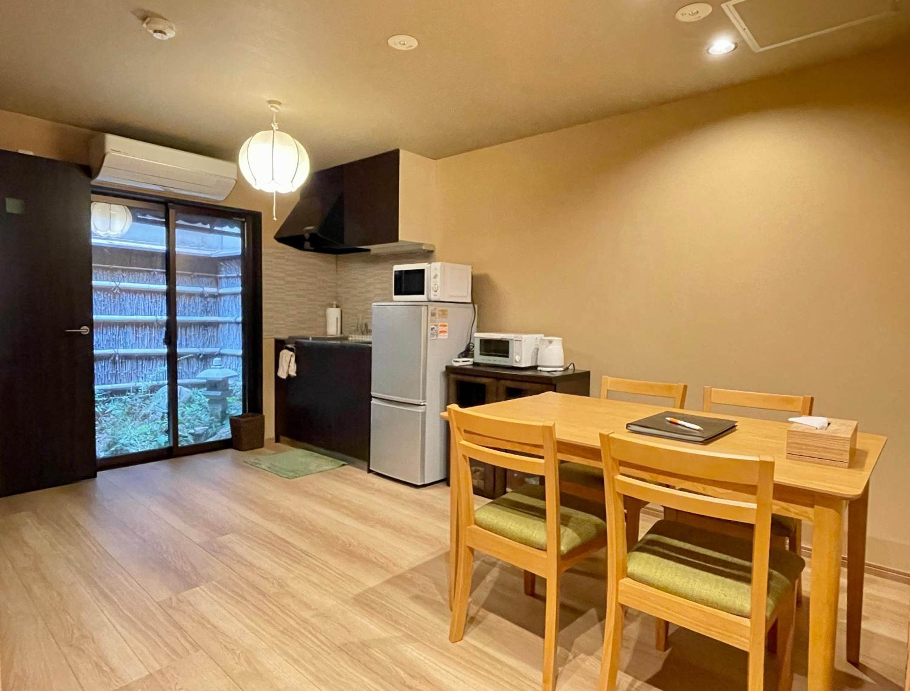 Three-Bedroom House - Photo 30