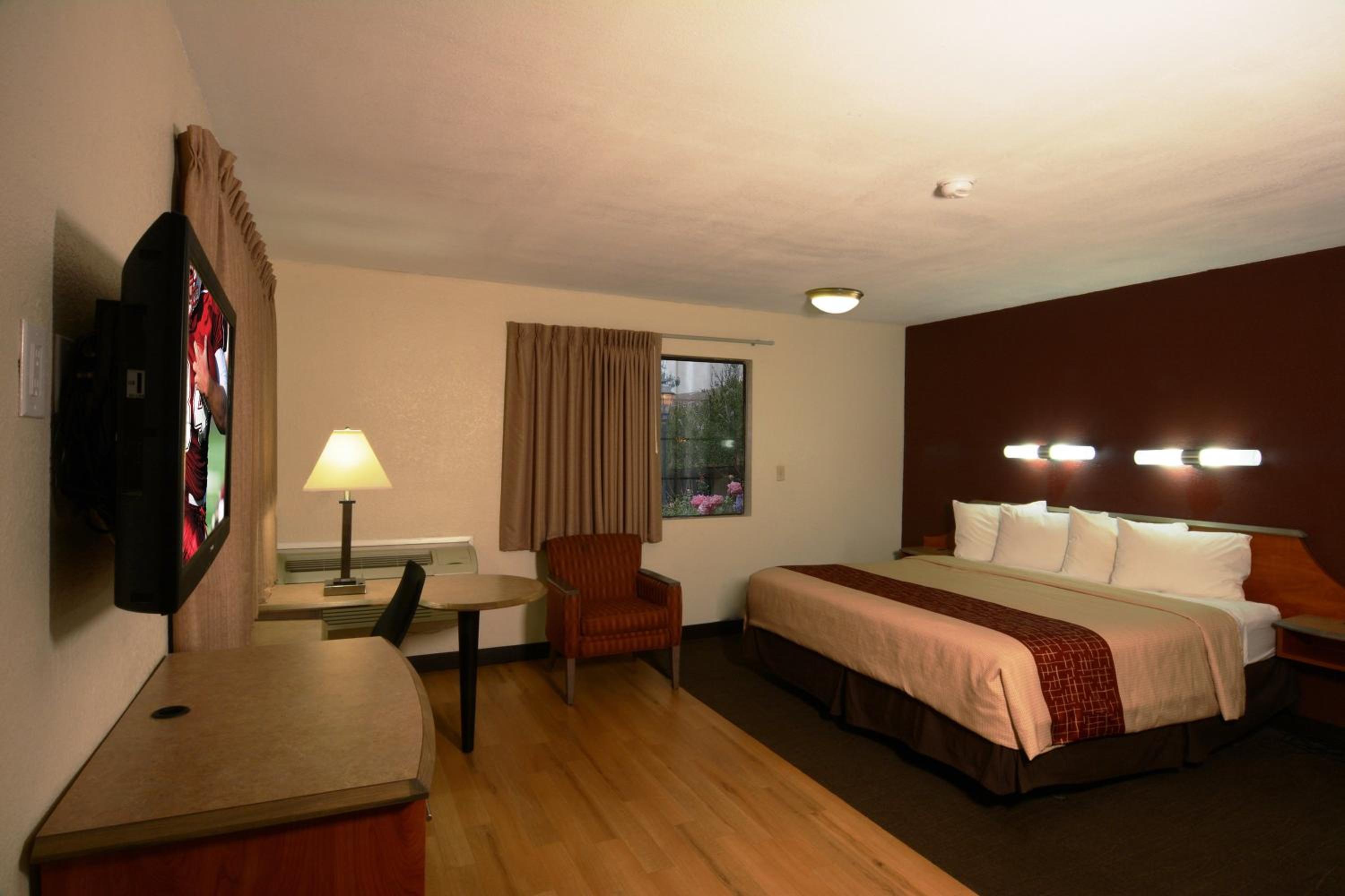 Suite One King Bed One Queen Bed Smoke Free - Photo 1