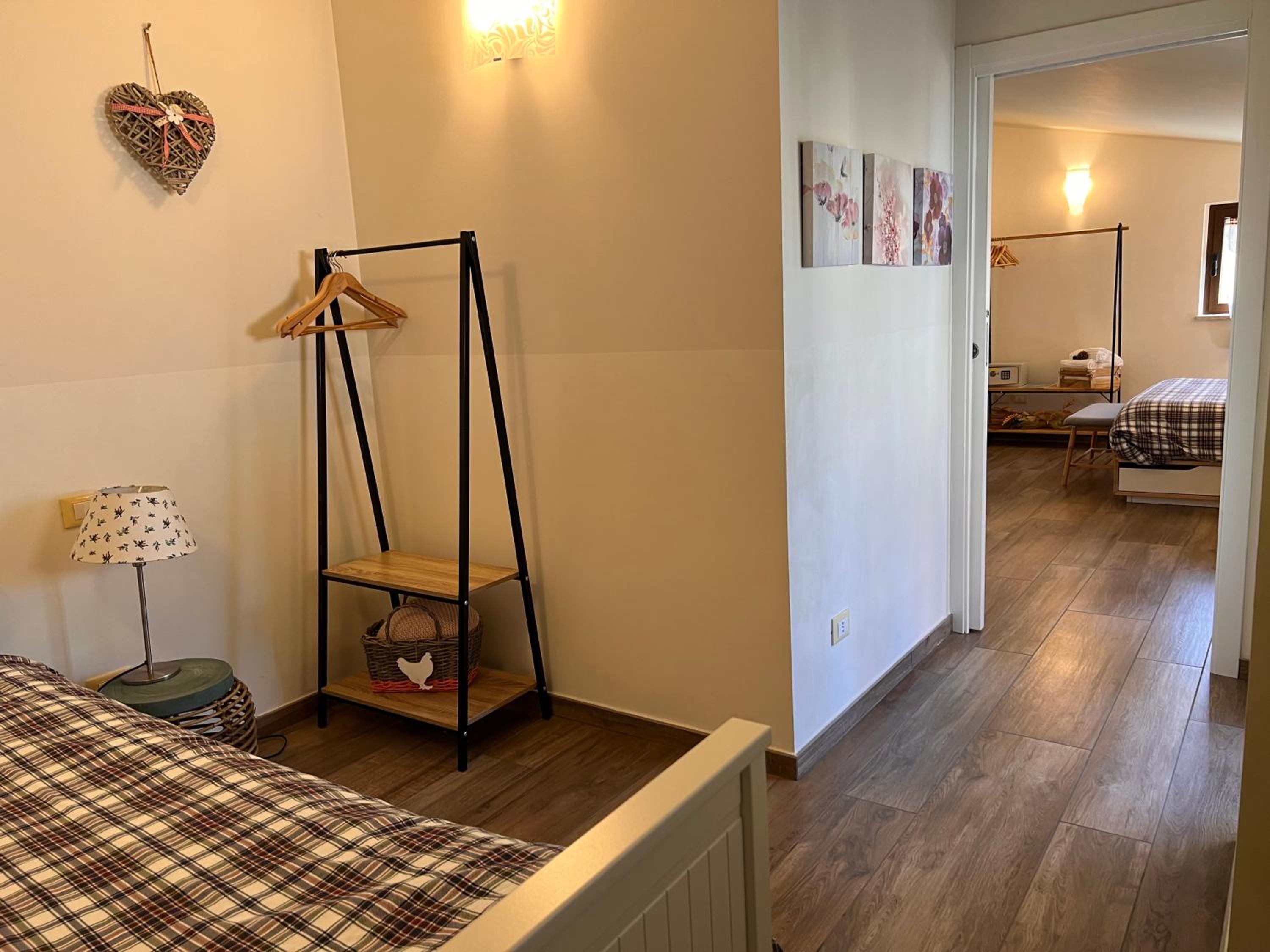 Deluxe Family Suite - Photo 16