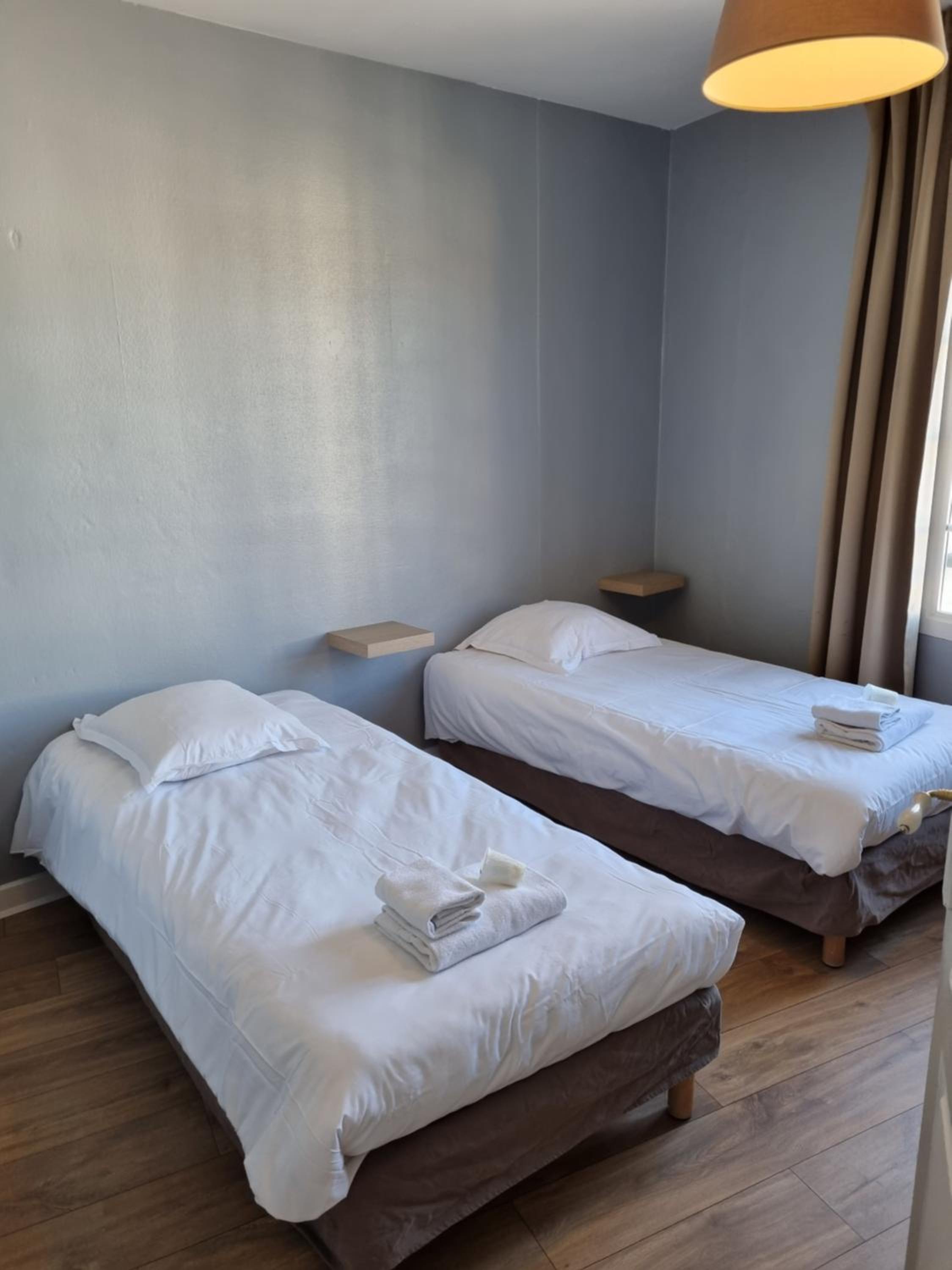 Standard Quadruple Room (private toilets and bathroom)