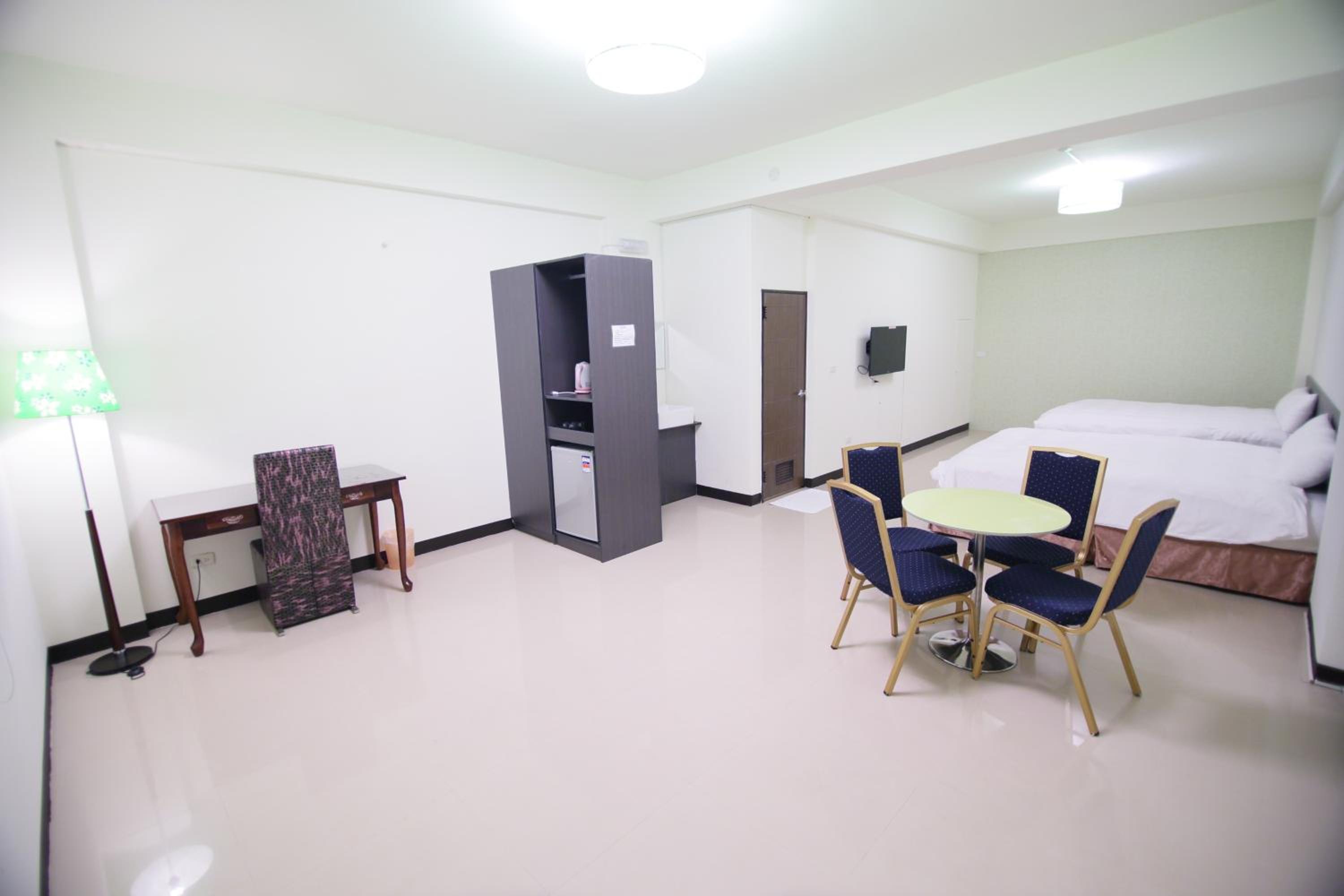 Quadruple Room with Two King Bed - select at check-in photo 3