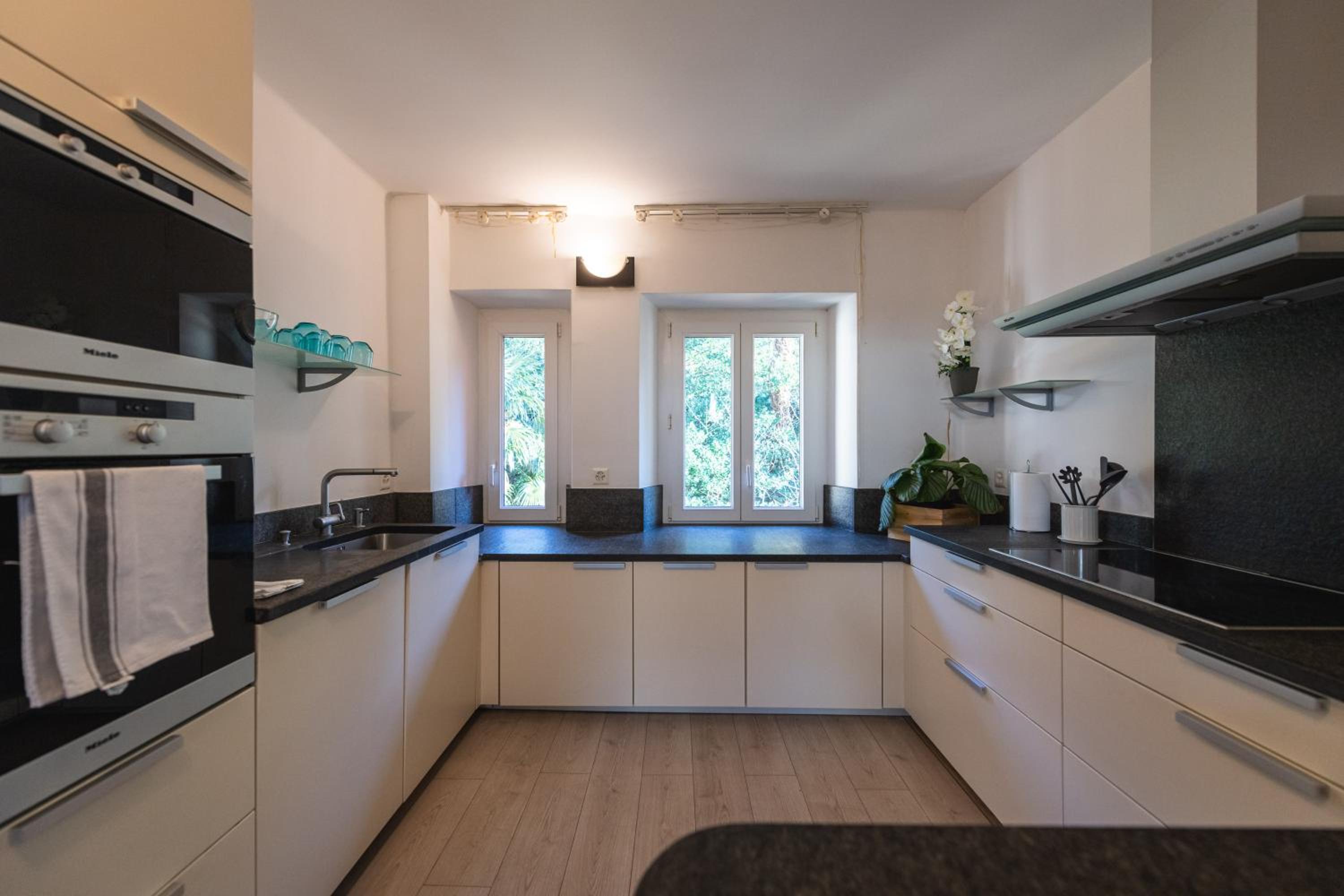 Three-Bedroom Apartment - Photo 25