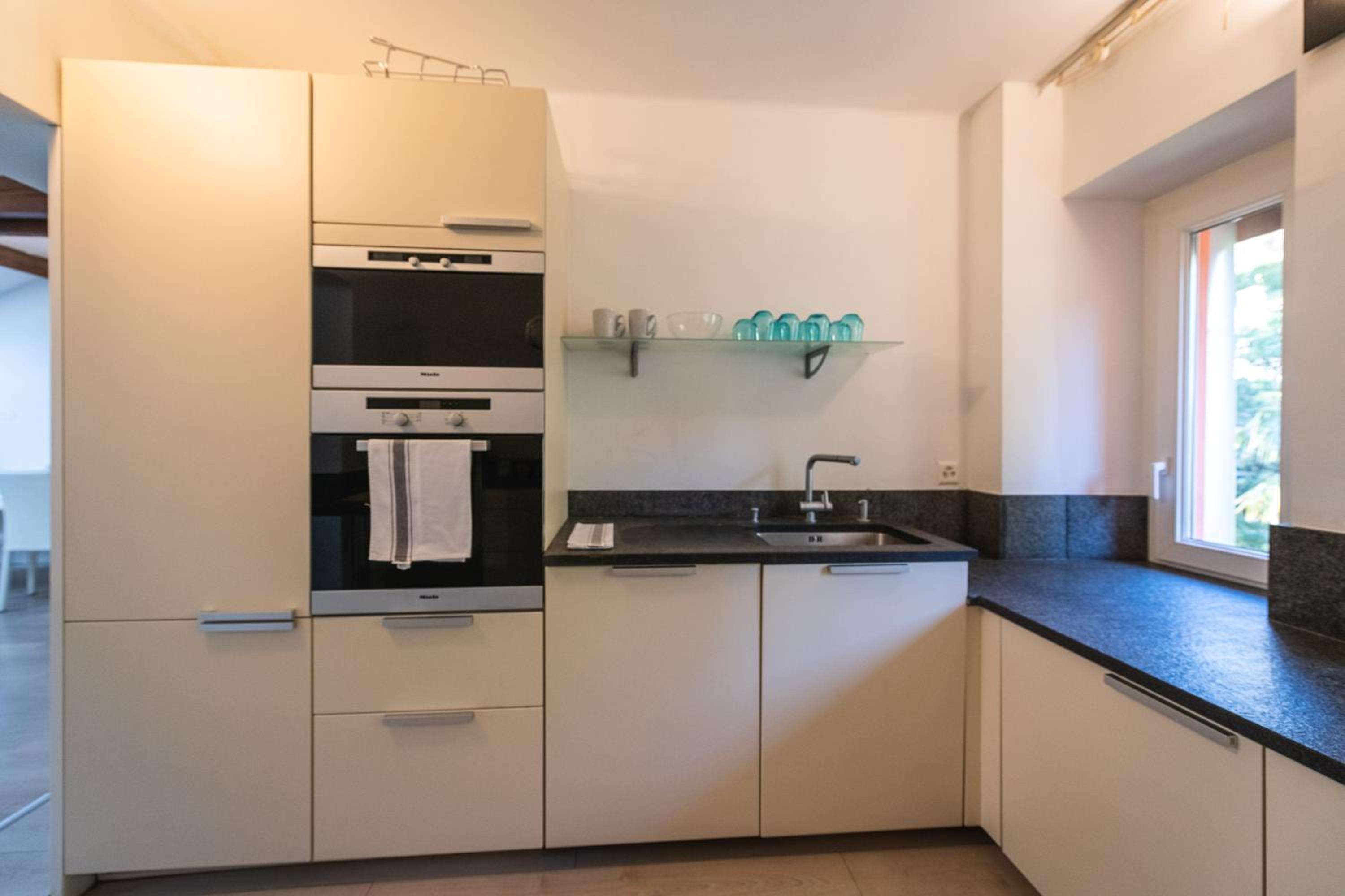 Three-Bedroom Apartment - Photo 10
