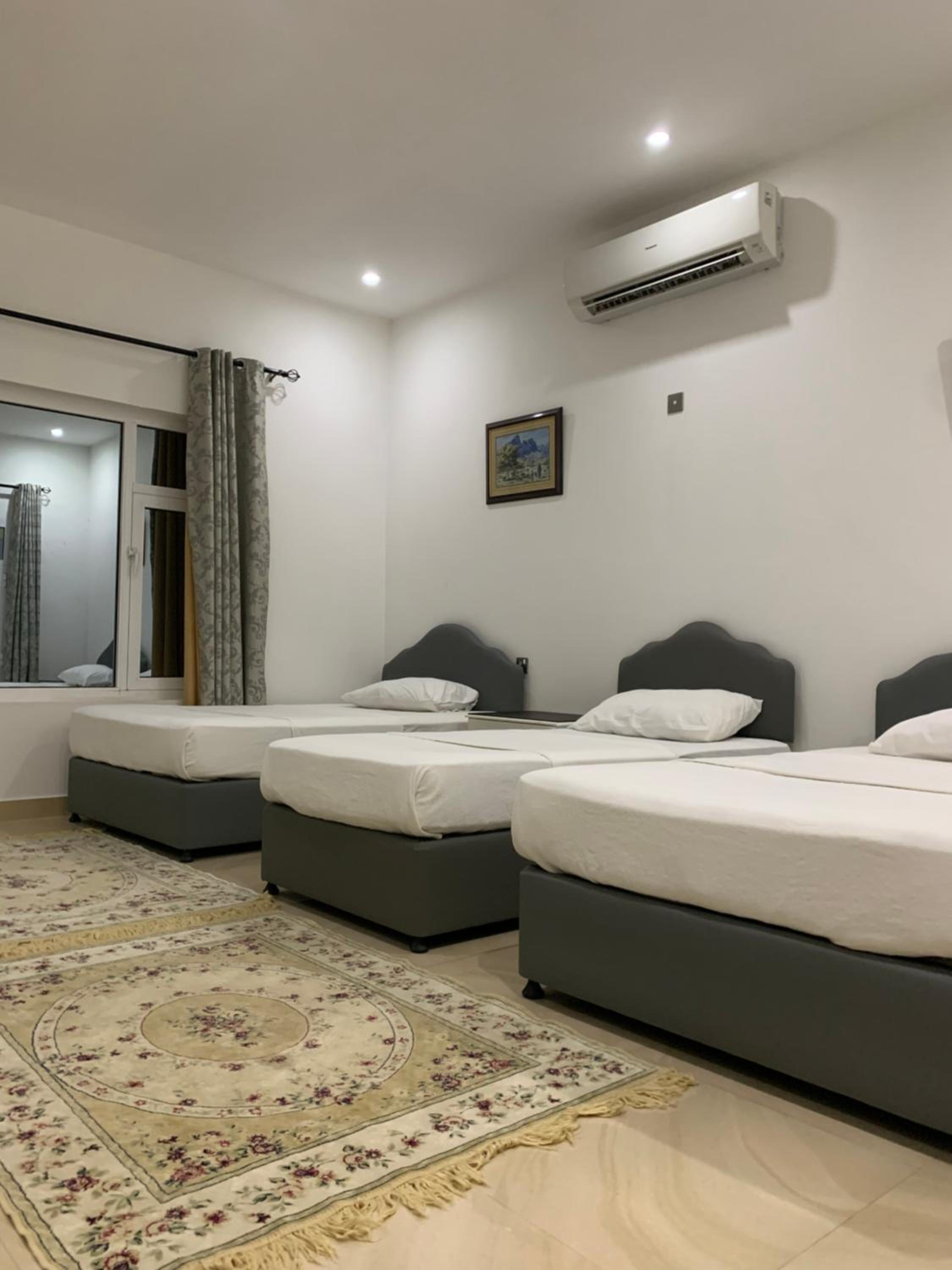 Deluxe Triple Room - Photo 1