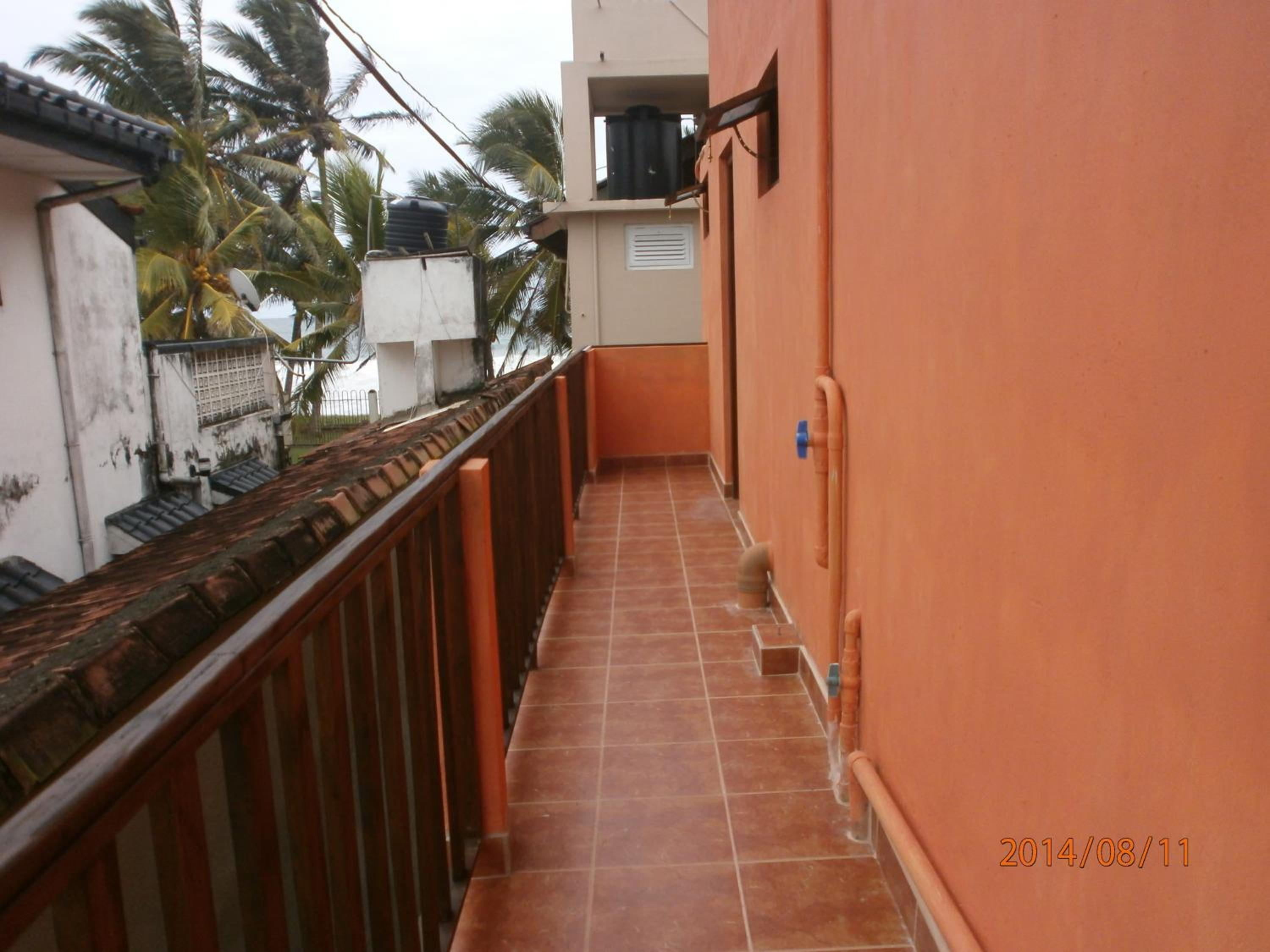 Family Room with Balcony - Photo 11