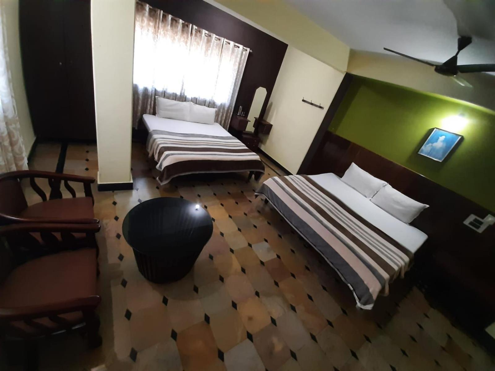 Deluxe Queen Room With Two Queen Beds photo 2