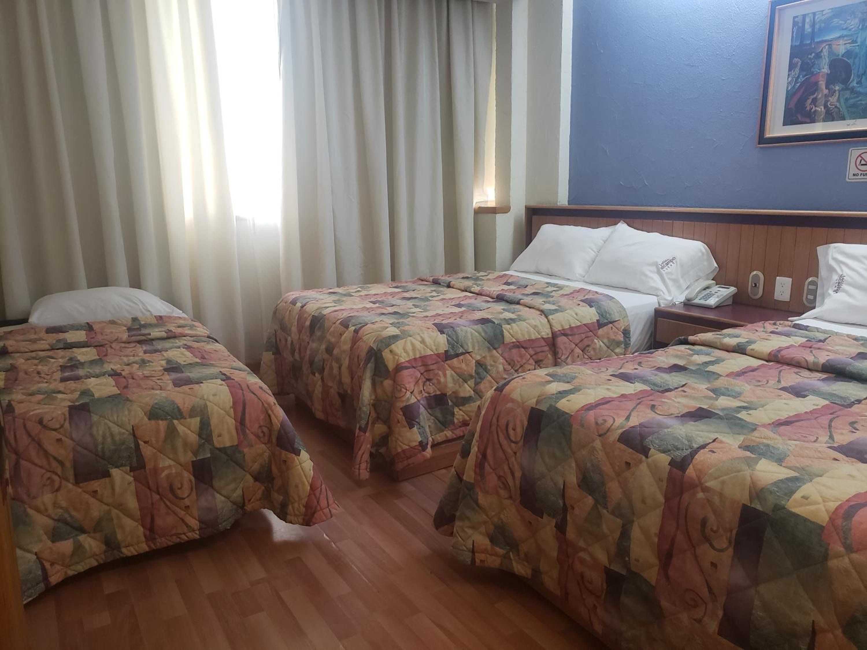 Deluxe Triple Room