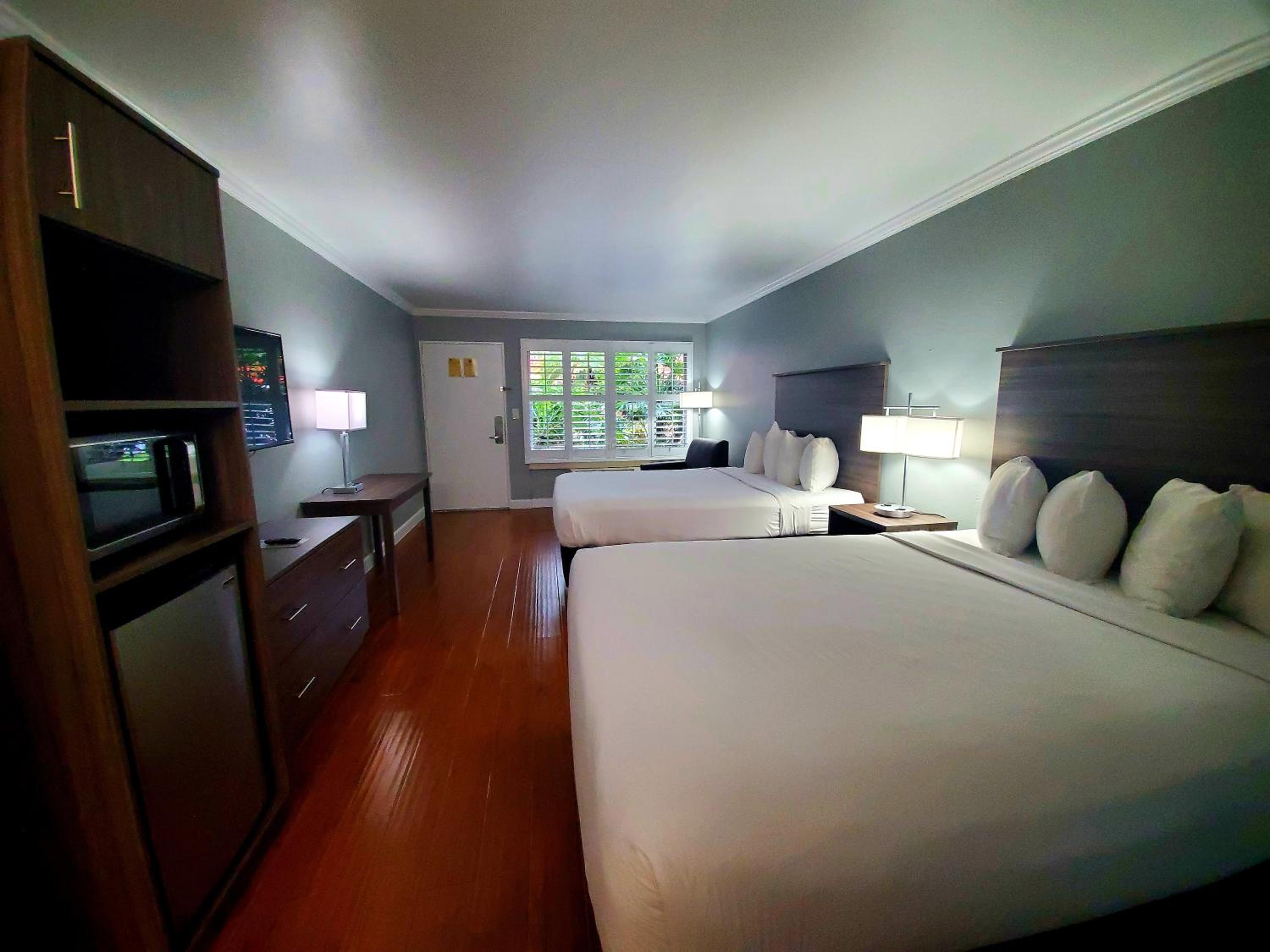 Queen Room with Two Queen Beds - Photo 1
