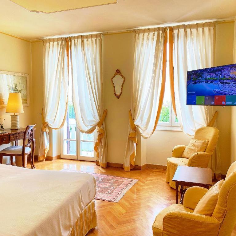 Chambre Double ou Lits Jumeaux de Luxe avec Balcon - Vue sur Lac