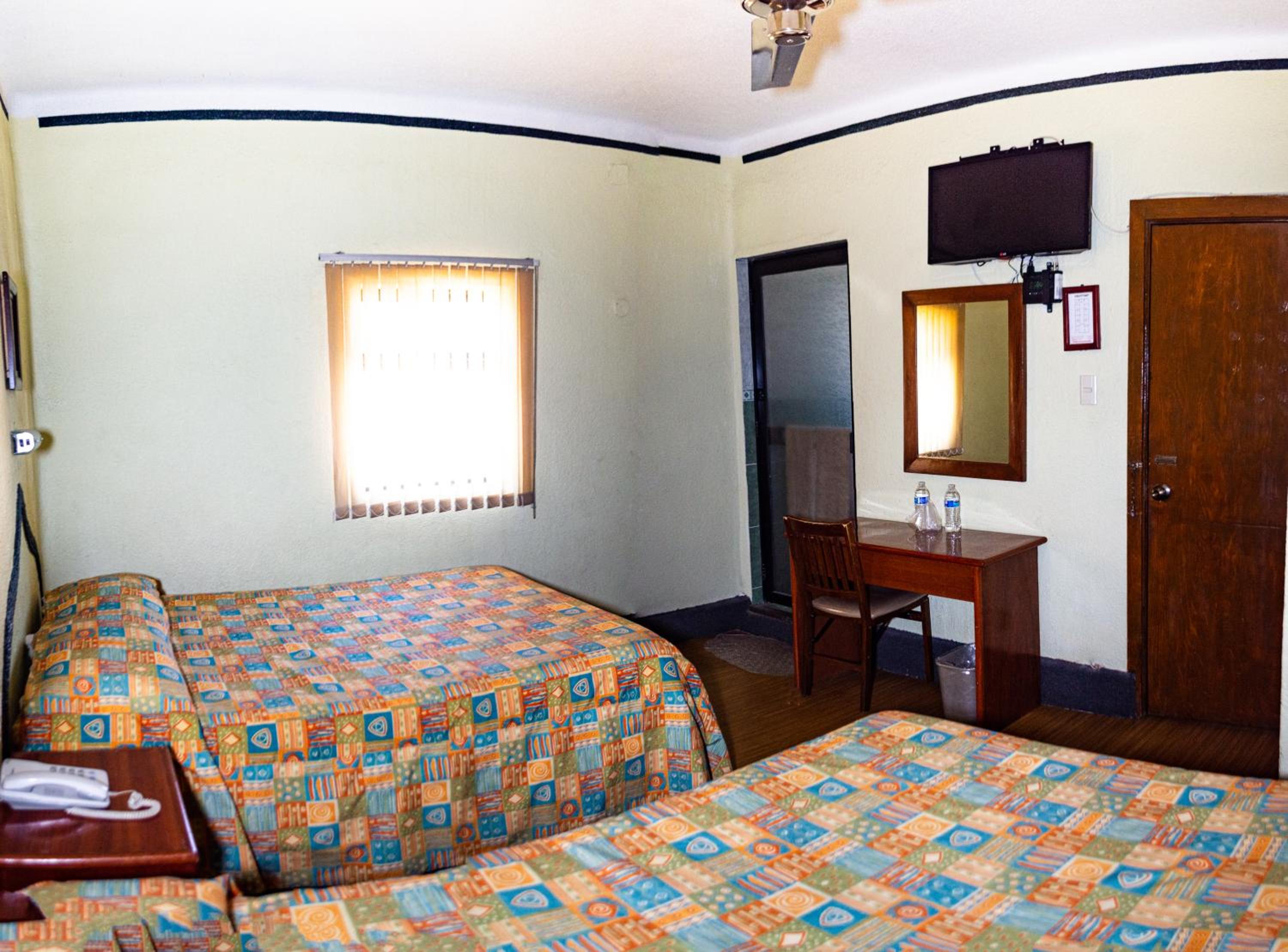 Quadruple Room with Private Bathroom