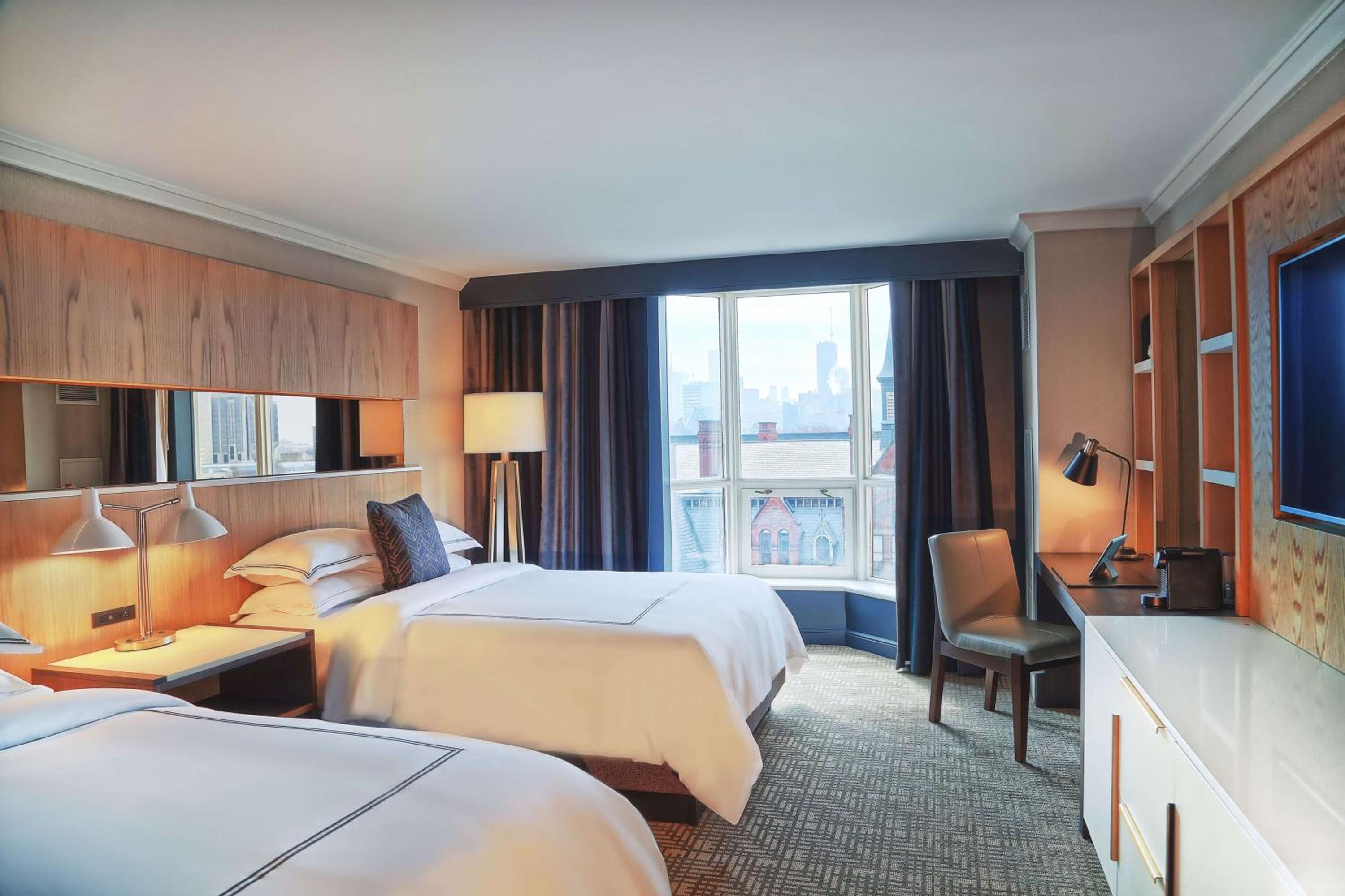 Deluxe Room with Two Queen Beds - Photo 1