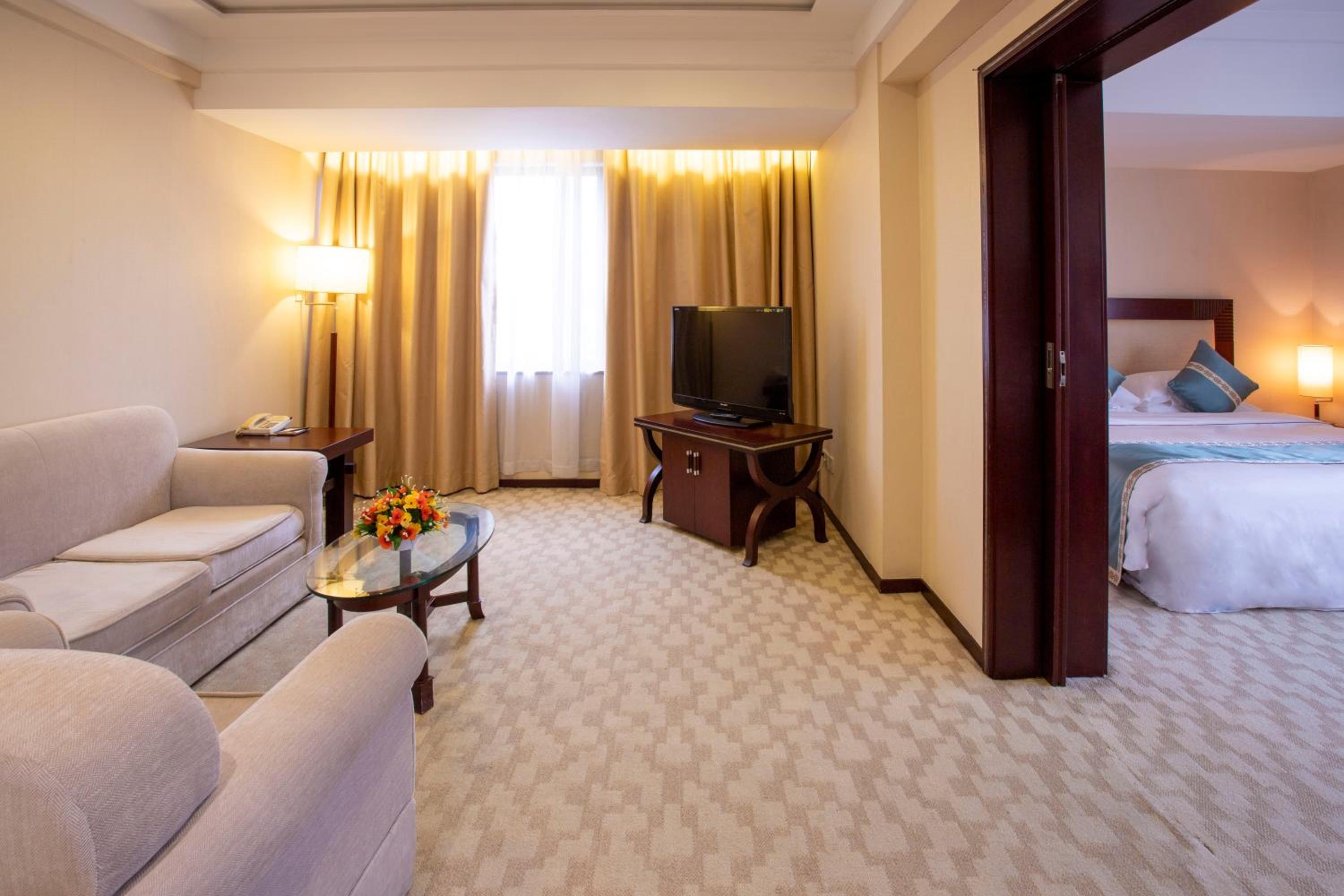 Deluxe Grand King Bed Room - Photo 5